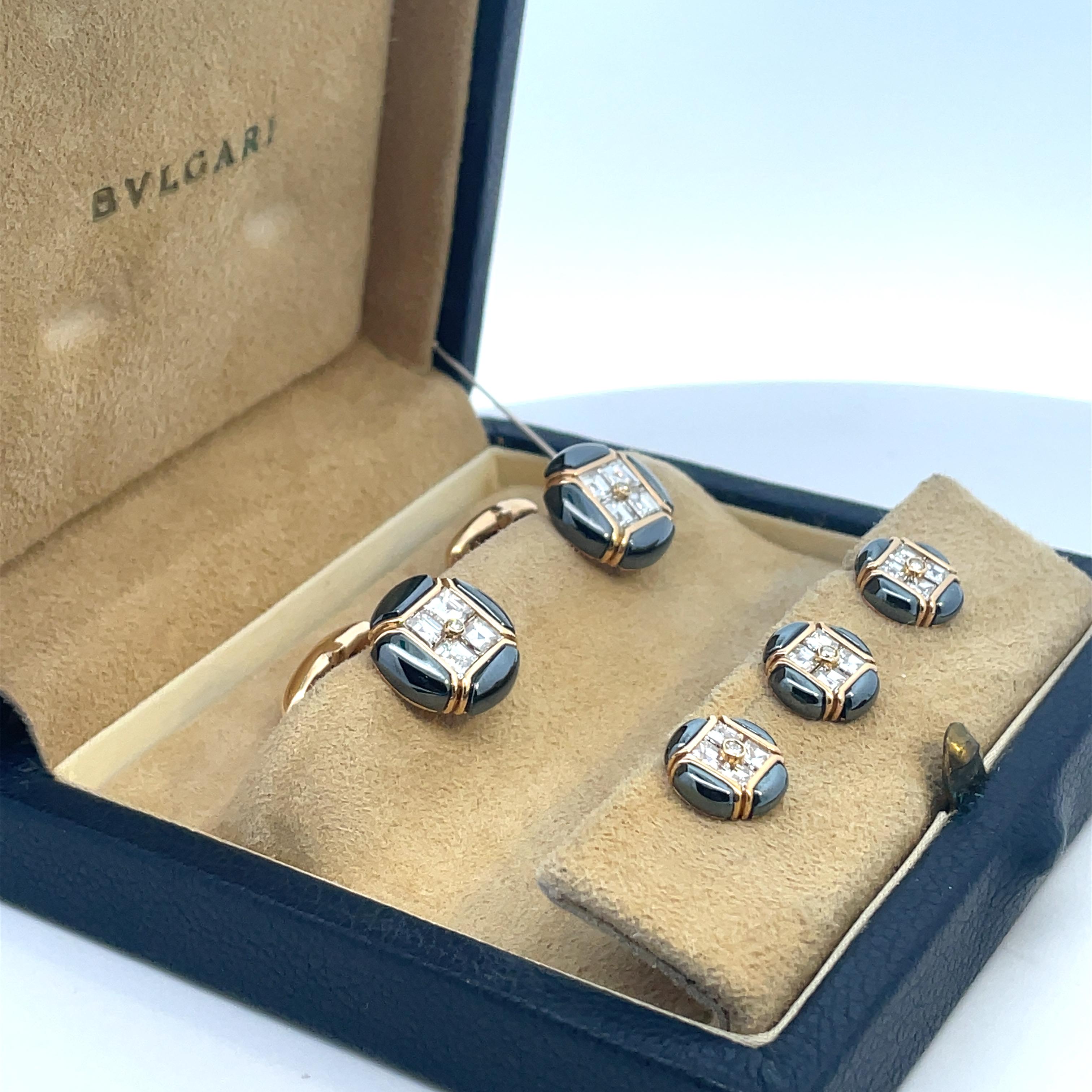 Unique and spectacular Bulgari Gold  Hematite and Diamonds Dress set, comprised of two cufflinks and three shirt button.
As new conditions in original Bulgari fitted Box.
