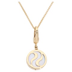 Colgante vintage Bulgari de madreperla con ilusión óptica en oro amarillo