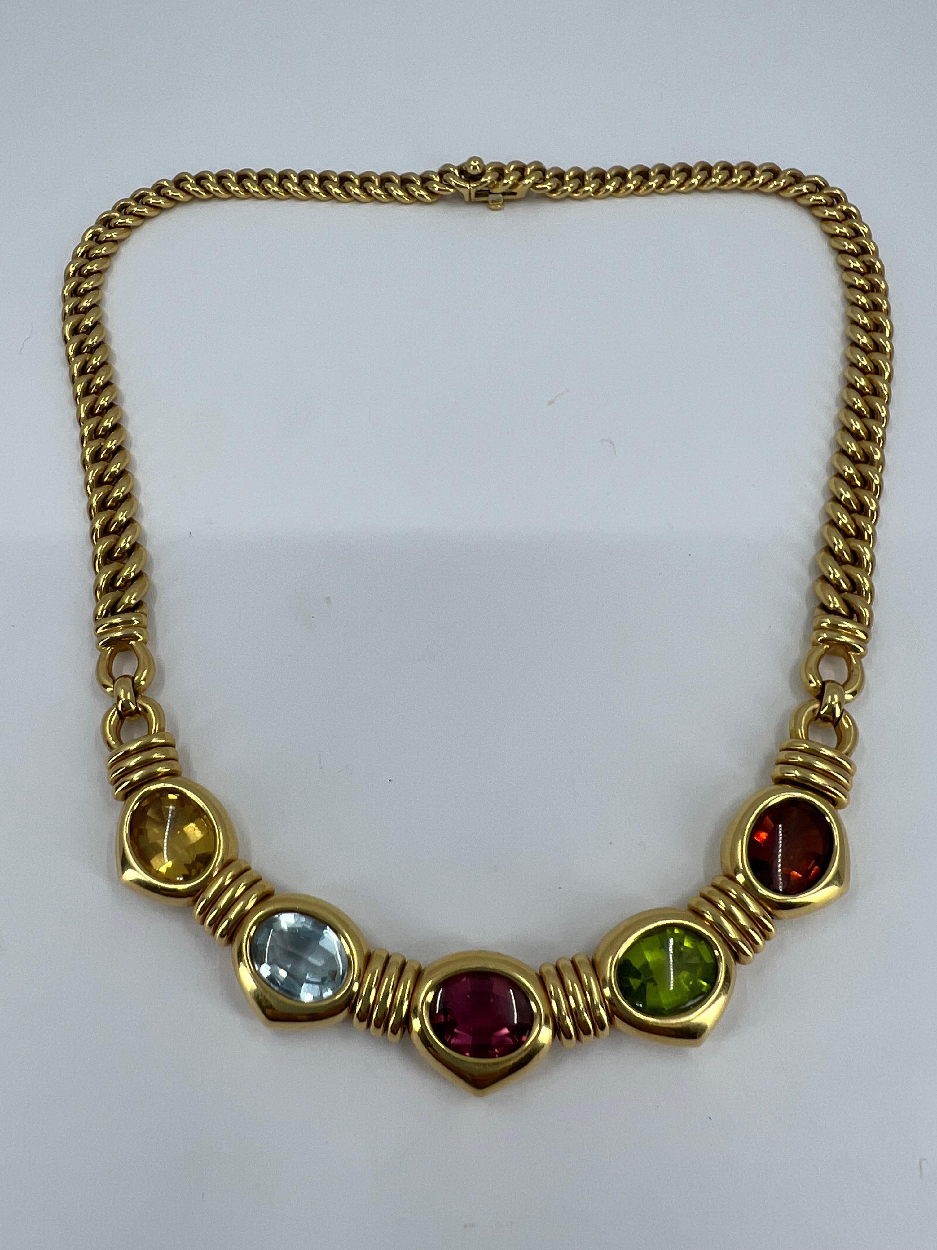 DESIGNER: Bulgari
CIRCA: 1980’s
MATERIALS: 18K Yellow Gold
GEMSTONE: Citrine, aquamarine, pink tourmaline, peridot and garnet
WEIGHT: 85.9 grams
MEASUREMENTS: 15- 1/2” x 1/2”
HALLMARKS: BVLGARI, 750

A beautiful vintage Bulgari necklace made of 18k