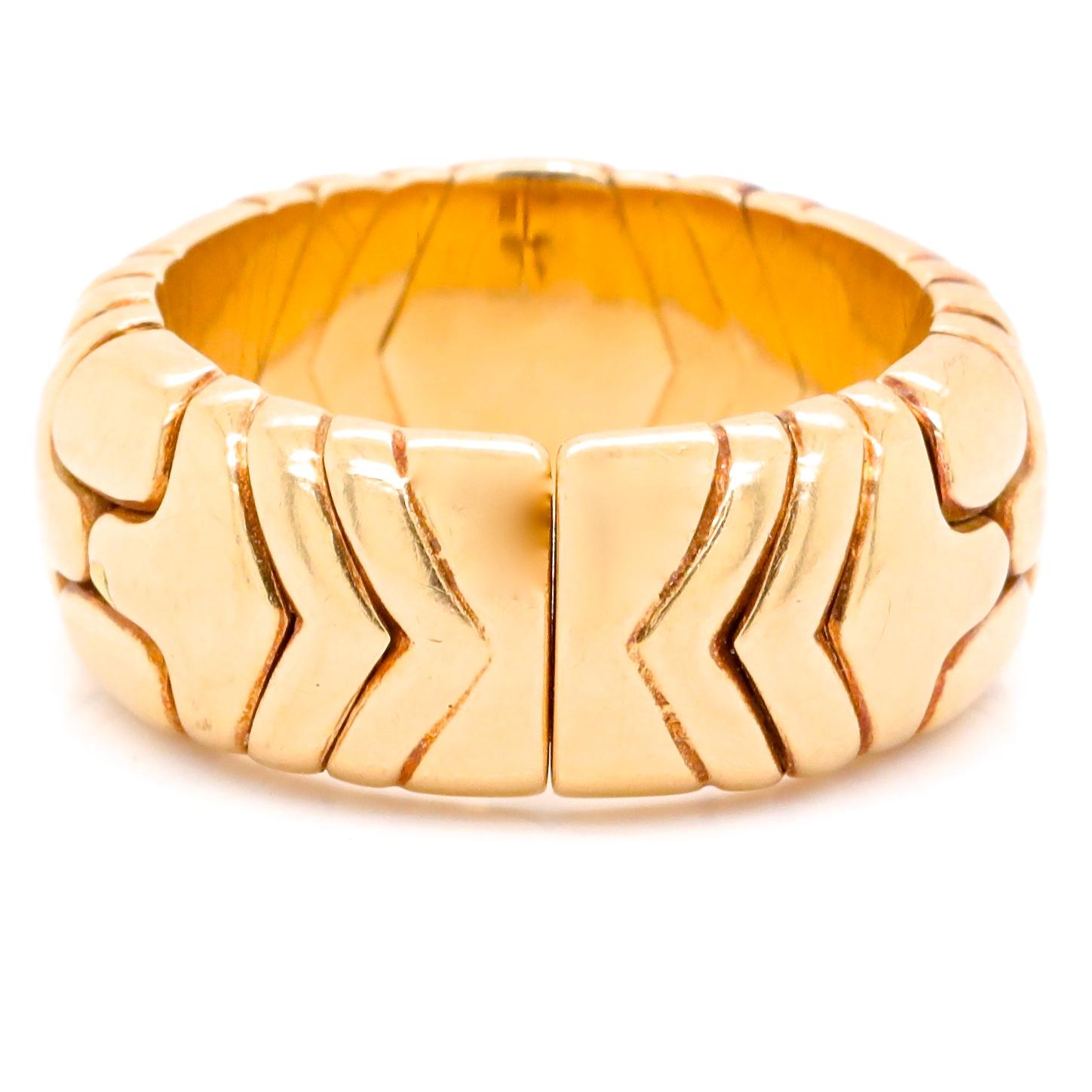 Iconic and desirable, the vintage Bulgari Parentesi ring is still stylish and as always will make you feel good wearing it. The ring is signed Bulgari, 1989, with Italian hallmarks. Circa 1989.
In 18k yellow gold. Adjustable size 6 1/4 - 7. 