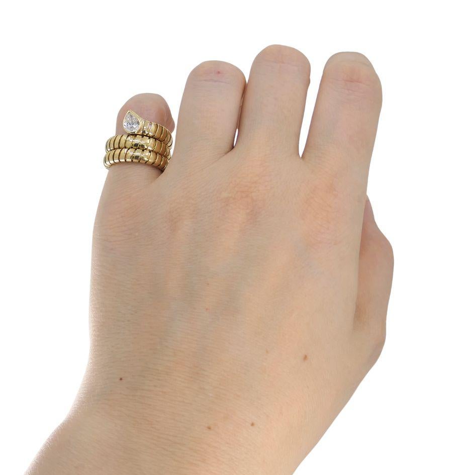 DESIGNER: Bulgari
CIRCA: 1980’s
MATERIALS: 18K Yellow Gold
GEMSTONE: Pear cut Diamond
WEIGHT: 17.6 grams
RING SIZE: 5-6
HALLMARKS: BVLGARI, 750, Serial Number

A beloved Serpenti Tubogas rign by Bulgari, made of 18k gold, features a pear cut