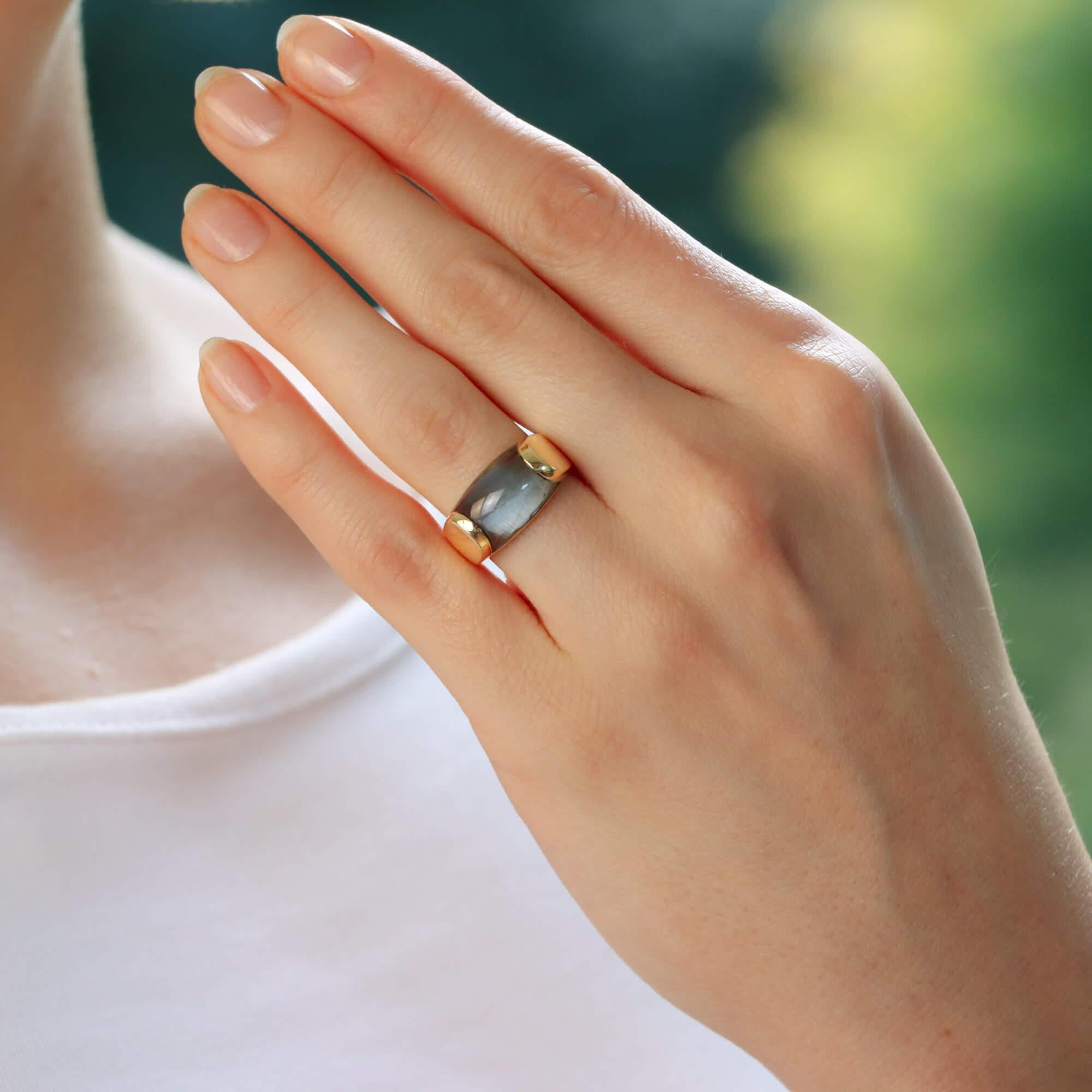 An incredibly stylish vintage Bulgari ‘Tronchetto’ topaz bombe ring set in 18k yellow gold.

From a discontinued collection, the ring is composed of a bombe design, set to the top with a carved piece of blue topaz.

Due to the design and size, this