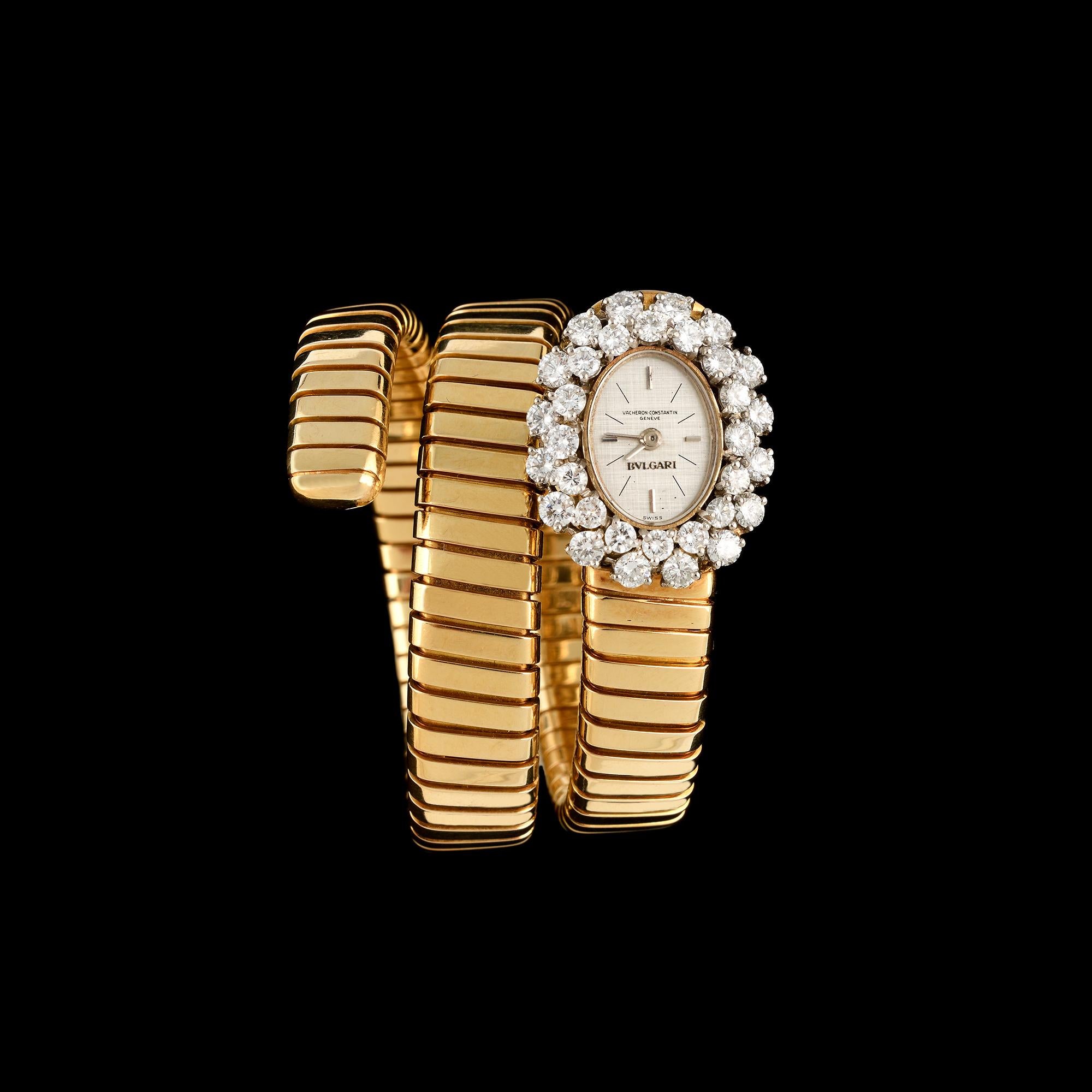 Tubogas Bracelet Watch in 18k Gold and Two Row Brilliant Cut Diamonds
Circa 1970s
Back Wind Movement
Dial signed Vacheron-Constantin and Bvlgari
Bracelet signed Bvlgari, Italian control marks, and stamped 750
Size/dimensions: case width 19mm
Gross