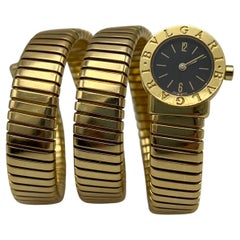 Bulgari Serpenti Tubogas Wickel-Armbanduhr, Gelbgold, schwarzes Zifferblatt