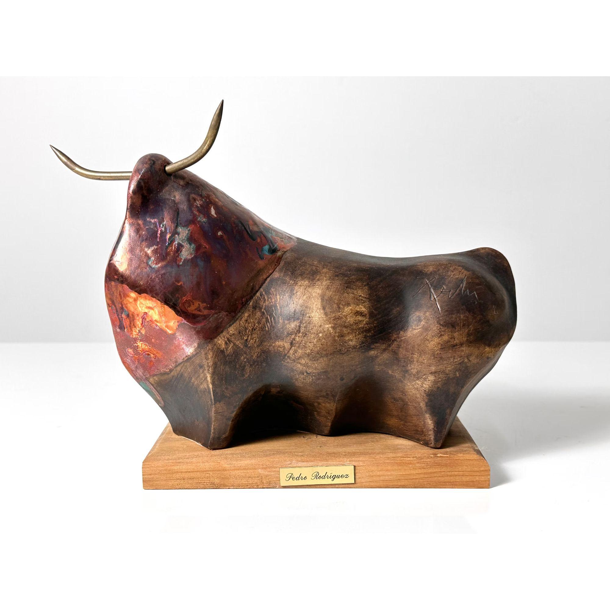 Vintage Pedrin Pedro Rodriguez Bull Sculpture Spanish 1990s

Stylized bull sculpture by Spanish artist Pedrin or Pedro Rodriguez circa 1990s
Executed in resin with metallic glaze and brass horns
Signed to the piece and base

Additional
