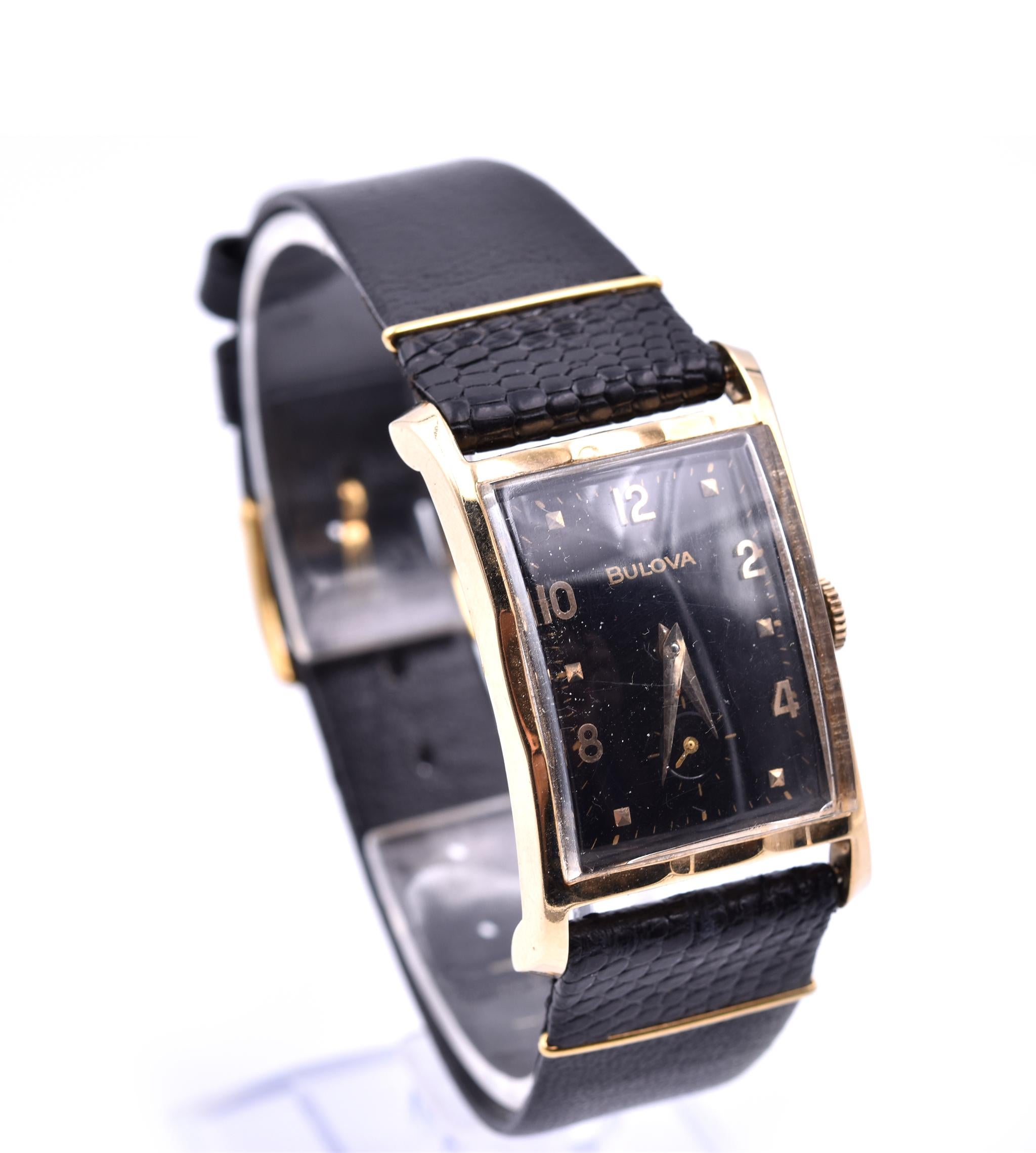 Movement: manual wind 17 jewels
Function: hours, minutes, sub-seconds
Case: rectangular 37mm x 24.5mm 14k yellow gold case, plastic crystal, pull/push crown, solid case back
Dial: black dial with alternating dot and arabic hour markers, gold sword