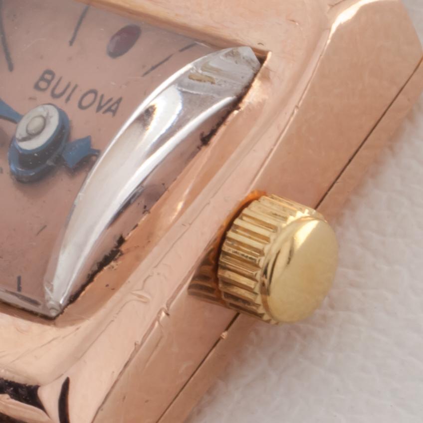Bulova Montre habillée vintage en or rose 14 carats avec diamants et rubis Unisexe en vente