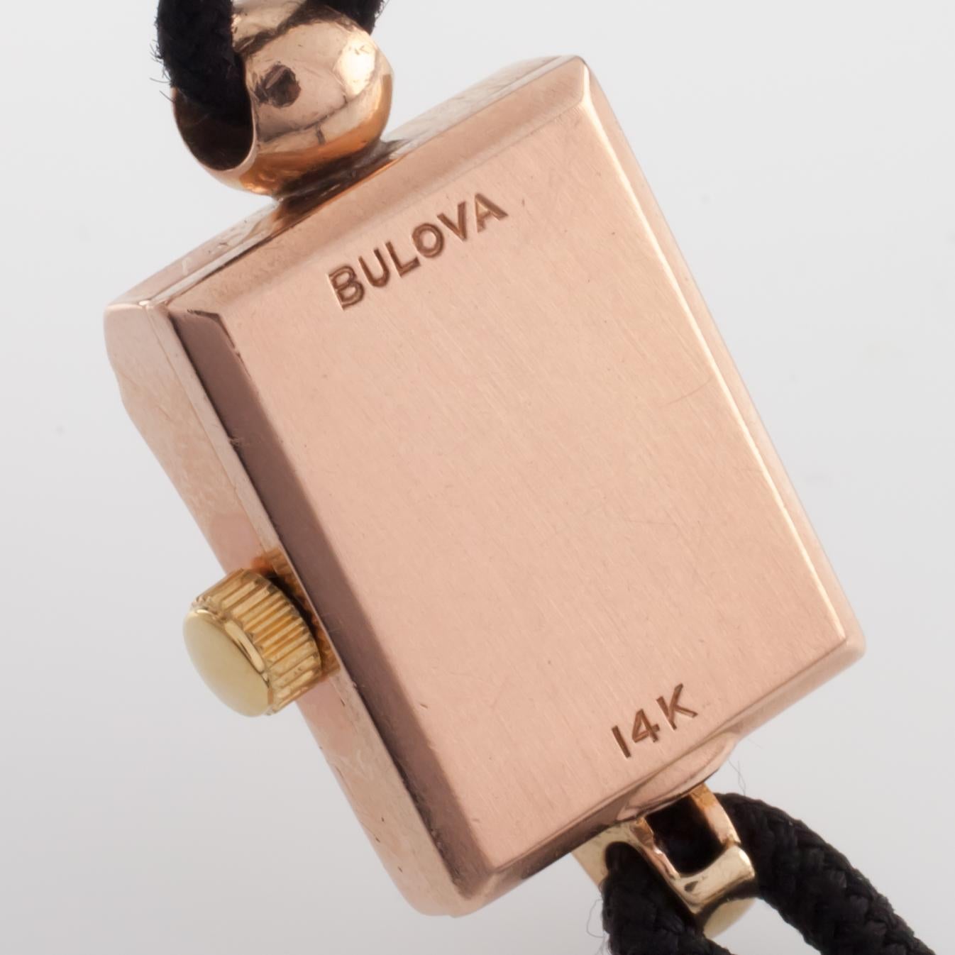 Bulova Montre habillée vintage en or rose 14 carats avec diamants et rubis en vente 2