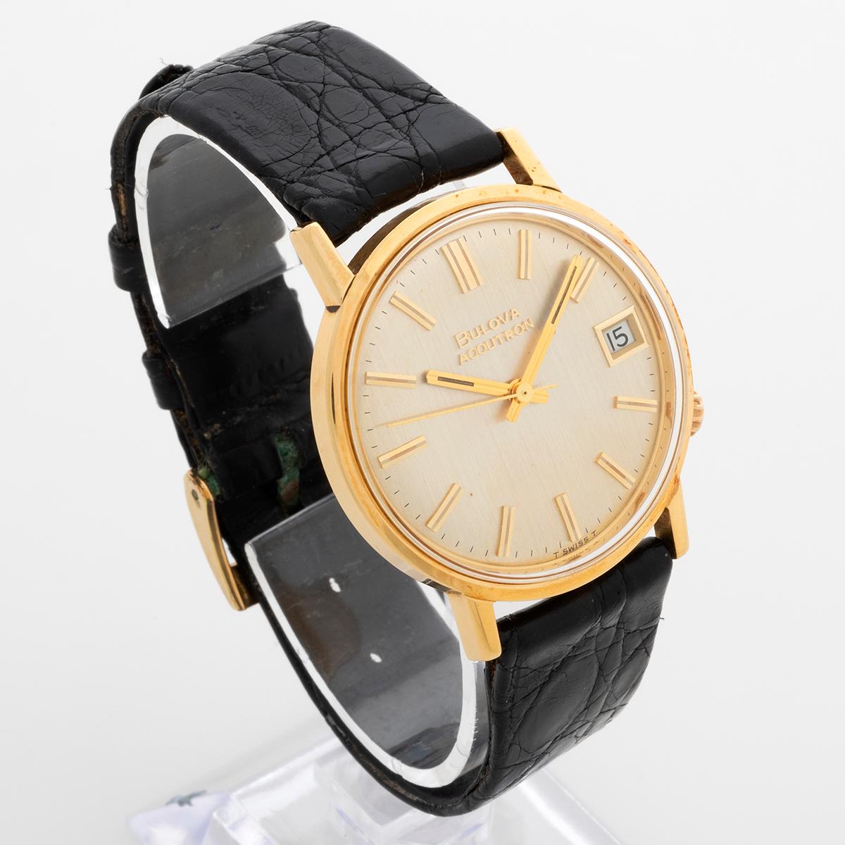 bulova accutron 18k gold watch