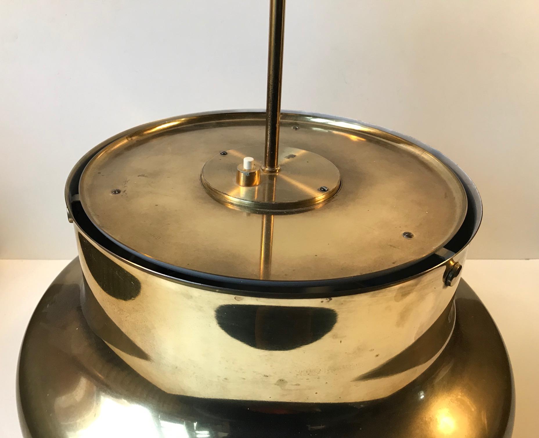 This is a large version of the 'Bumling' ceiling lamp designed by Anders Pehrson in 1968. It was manufactured by Atelje Lyktan in Åhus, Sweden, 1970s. It is made of solid brass that has developed a rainbow-like patina over the years. This lamp