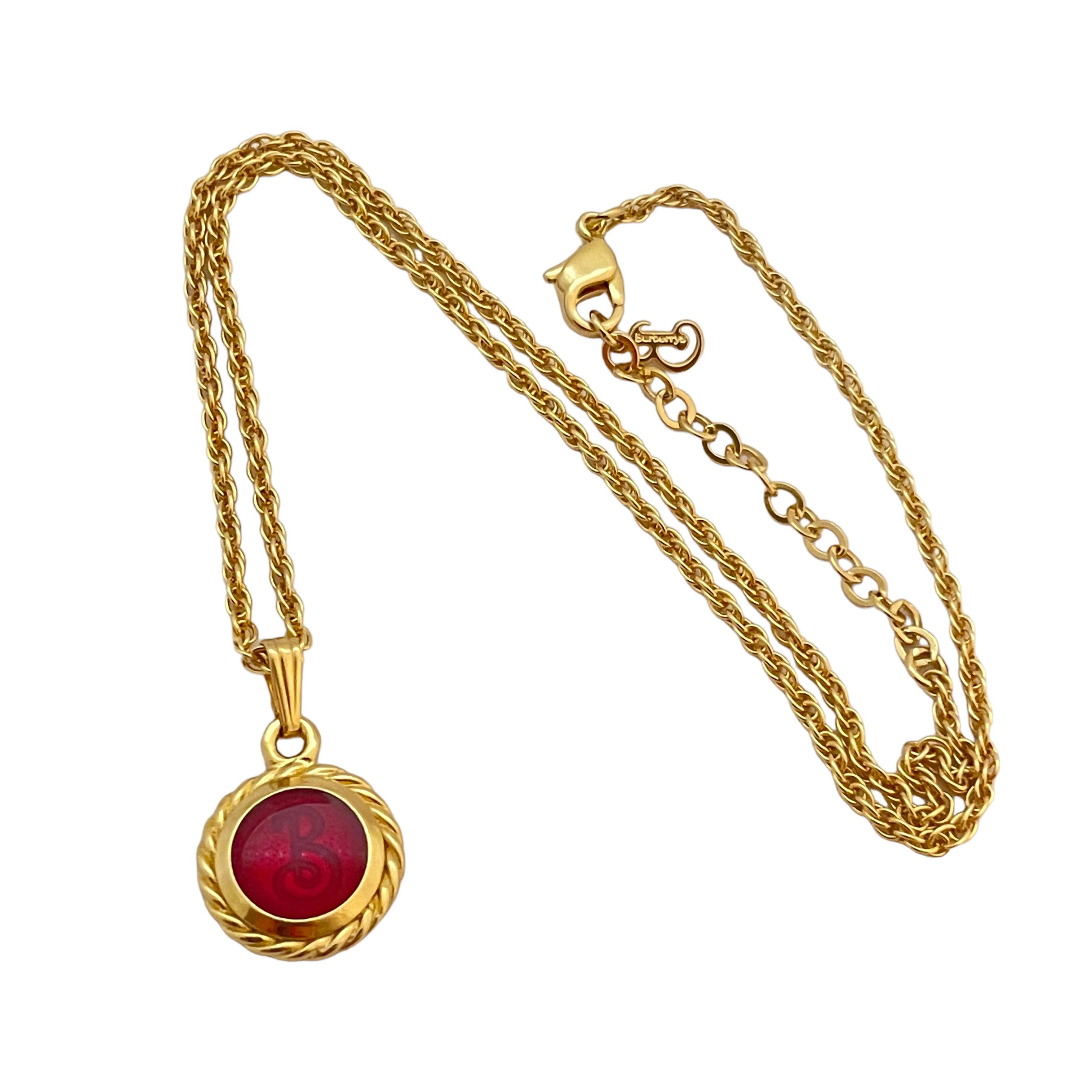 DETAILS

• signed BURBERRY'S 

• gold tone with red 

• vintage designer runway necklace

MEASUREMENTS

• 17