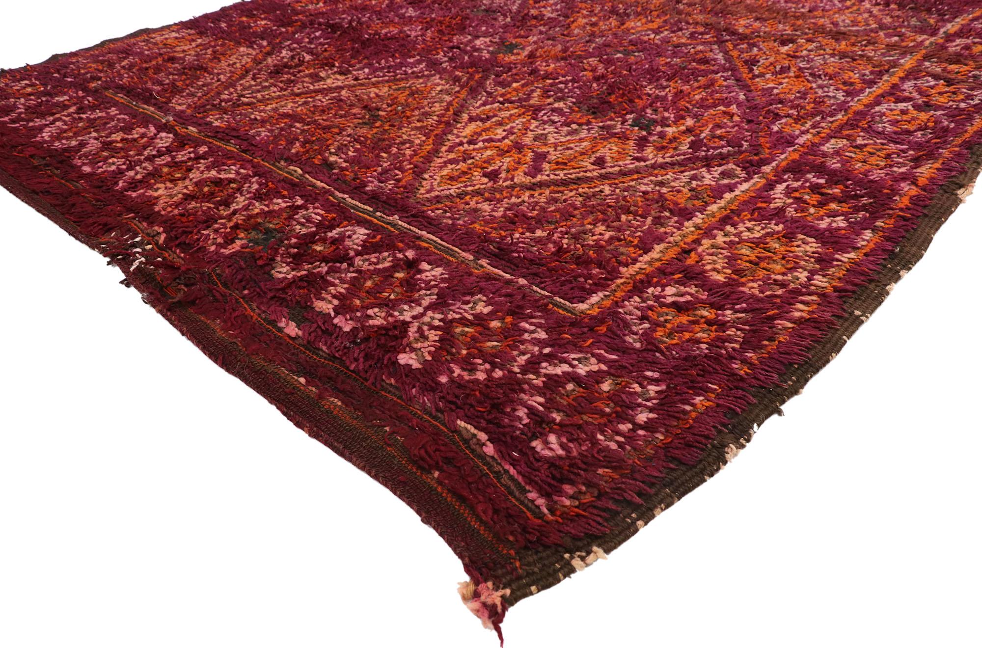 20966, vintage Beni M'Guild Moroccan rug with Retro Modern style. With vibrant splashes of colors and a bold geometric pattern, this hand knotted wool vintage burgundy Beni M'Guild Moroccan rug astounds with its beauty. Like an endless horizon, the