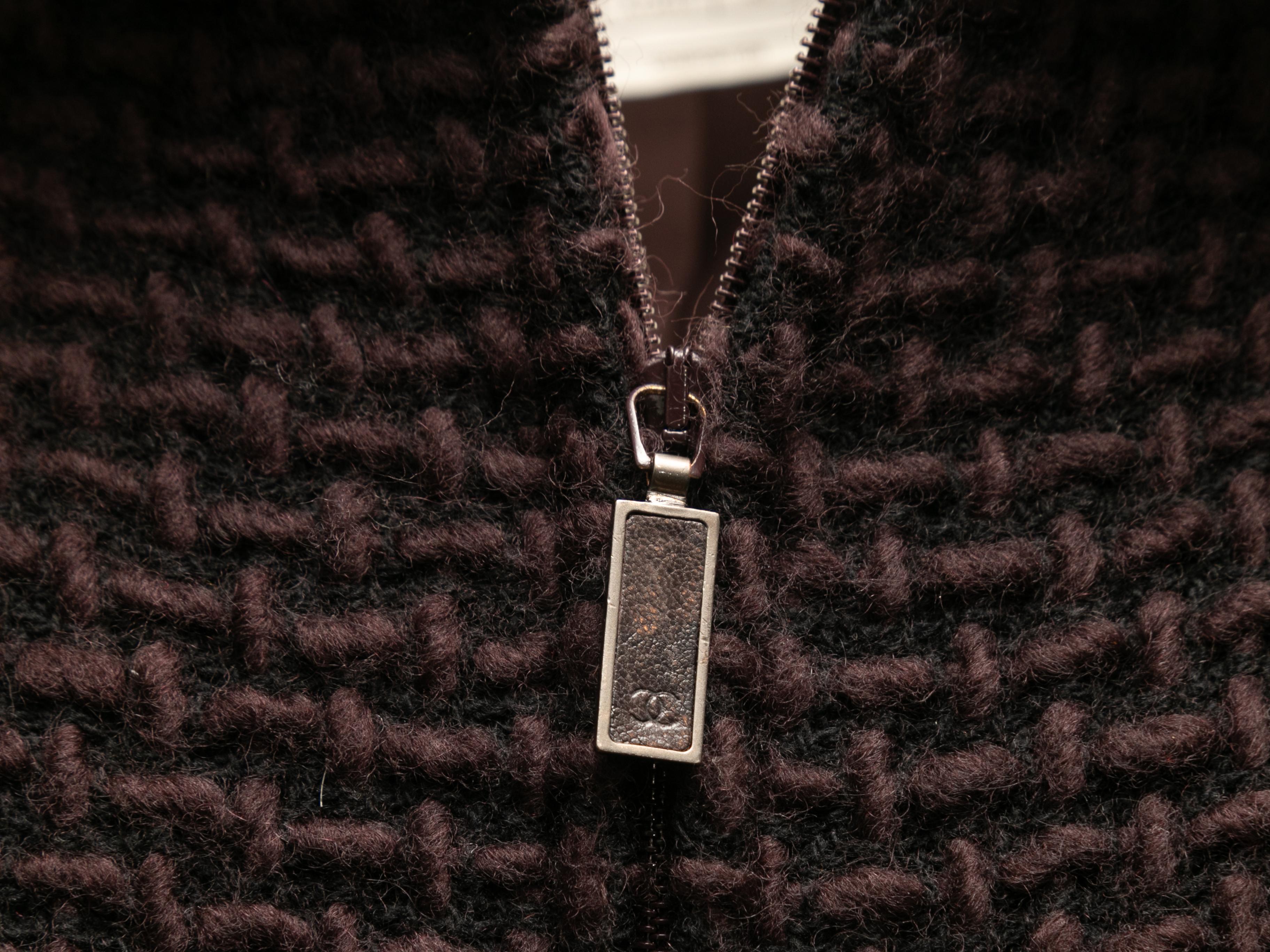 Vintage burgundy textured wool zip jacket by Chanel. From the Fall/Winter 2000 Collection. Mock neck. Zip closure at center front. 38