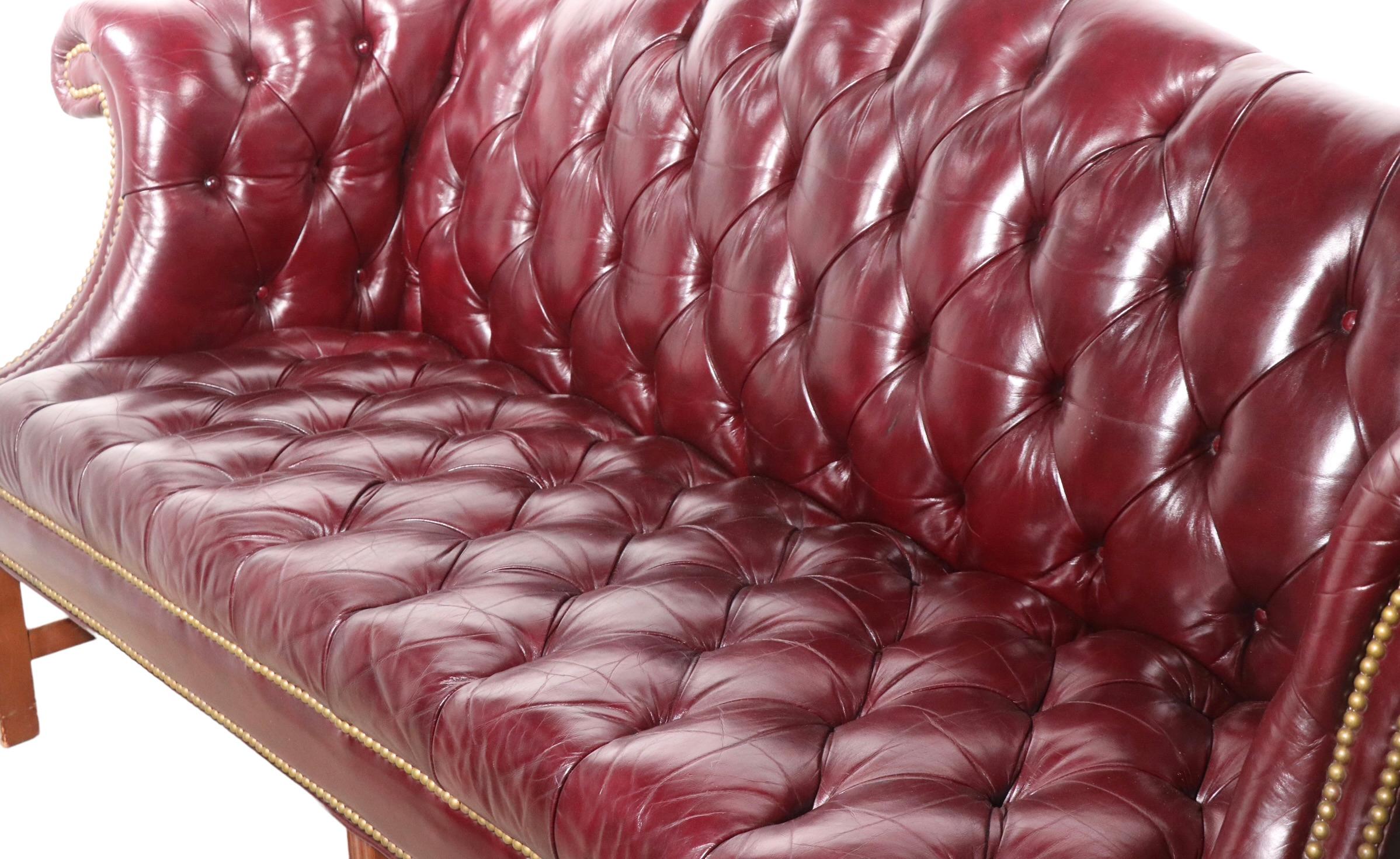 Vintage Burgundy Leather Chesterfield Sofa with Brass Nail Head Stud Trim In Good Condition In New York, NY