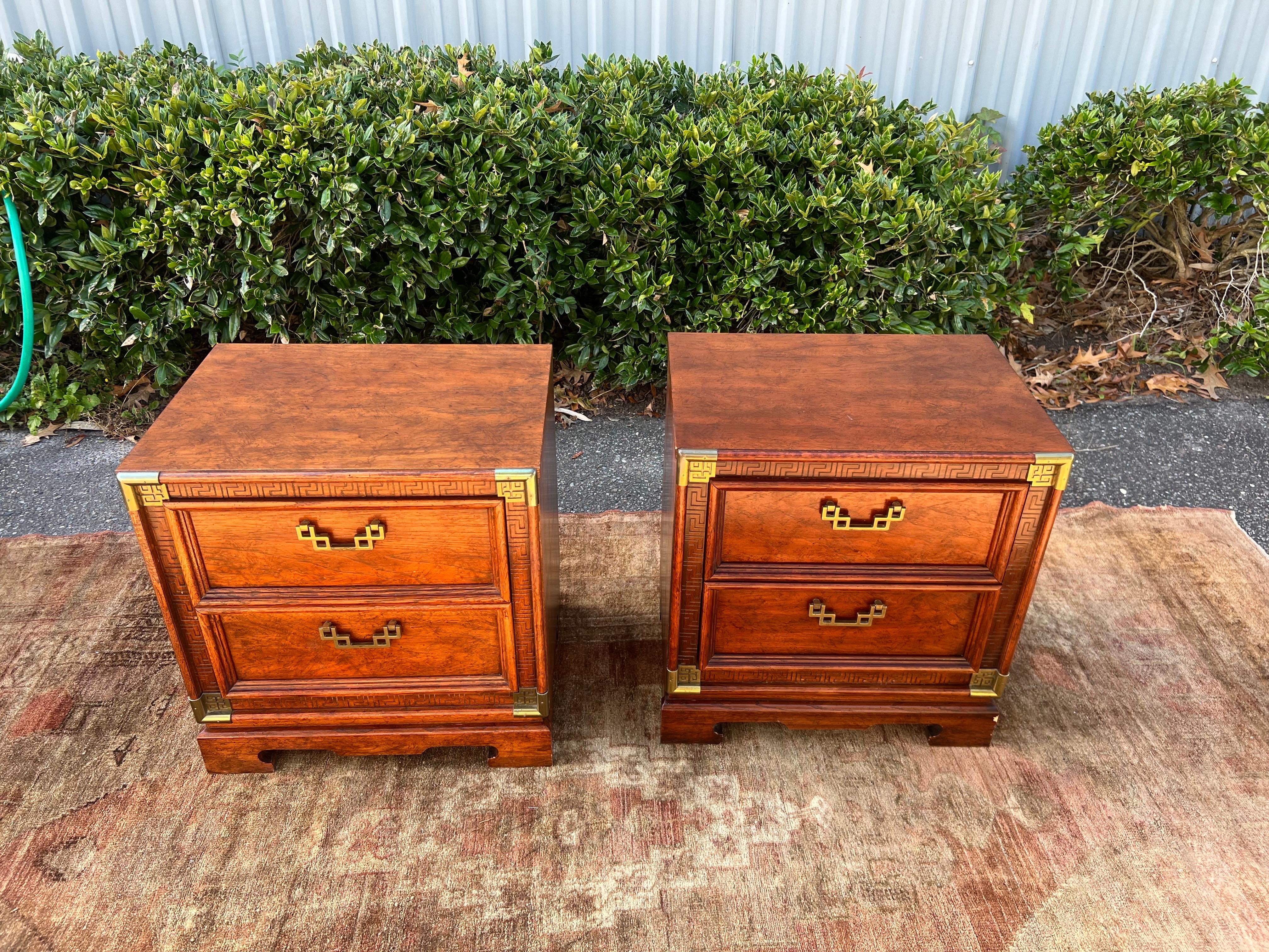 Vintage Burl and brass Chinoiserie Nightstands - a pair 

These Hollywood Regency chinoiserie nightstands are stunning in a walnut Burl with beautiful very detailed fretwork in the wood and in the brass accents.  Very unusual brass handles.  Circa
