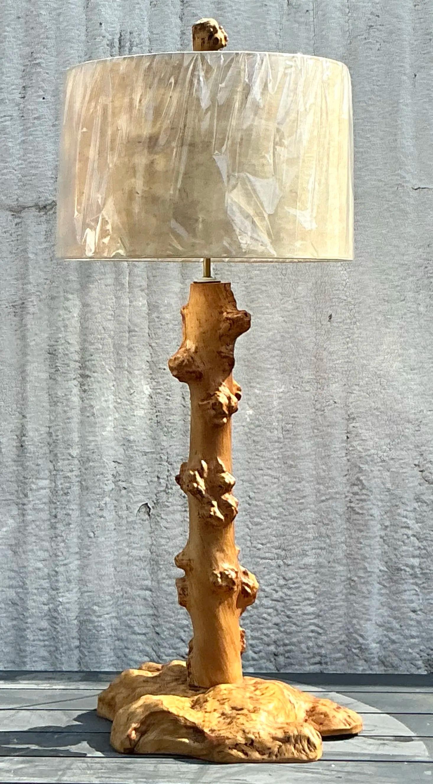 This vintage burl knot table lamp is a true statement piece, showcasing the natural beauty of richly textured burl wood. Paired with a coordinating wood shade, it creates a warm, organic aesthetic that’s both rustic and sophisticated. Perfect for