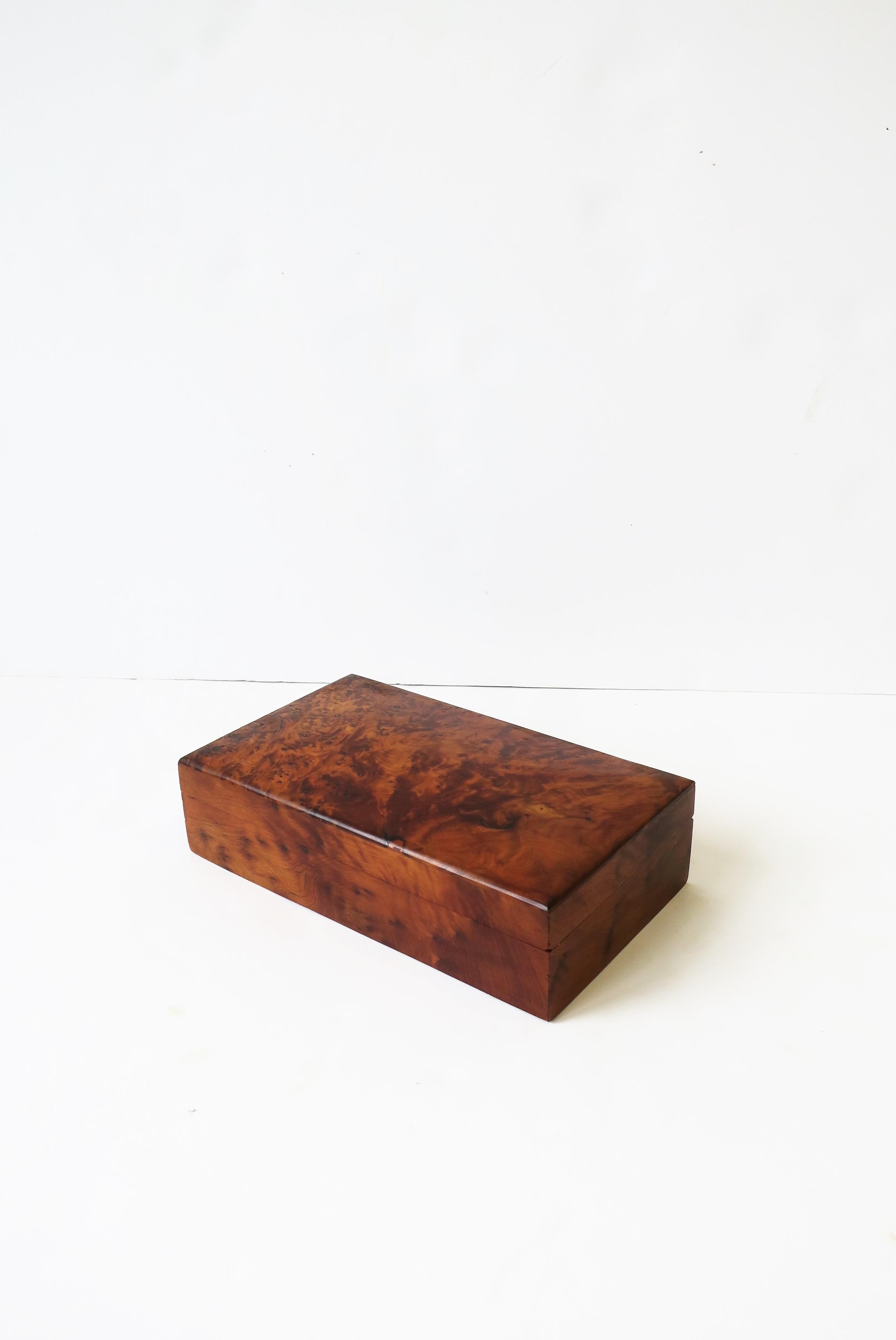 A modern rich burl wood jewelry, vanity, dresser or desk box, circa 20th century, Europe. A great box for many different items including jewelry (as demonstrated.) Dimensions: 5.38