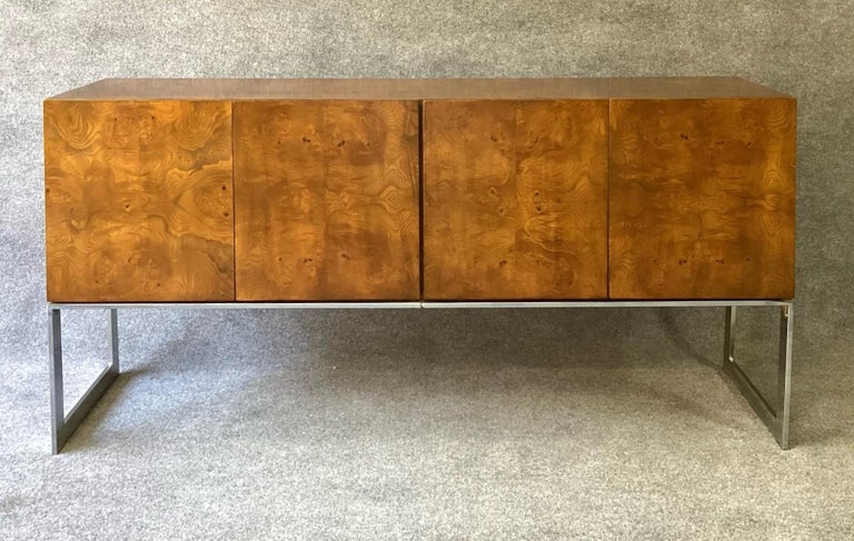 Beautiful vintage burl wood and chrome credenza by Milo Bughman for Thayer Coggin in United States, circa 1970s. This exceptional credenza stands out for the fine finishes, showing elegant and detailed figures in each of its angles. A completely