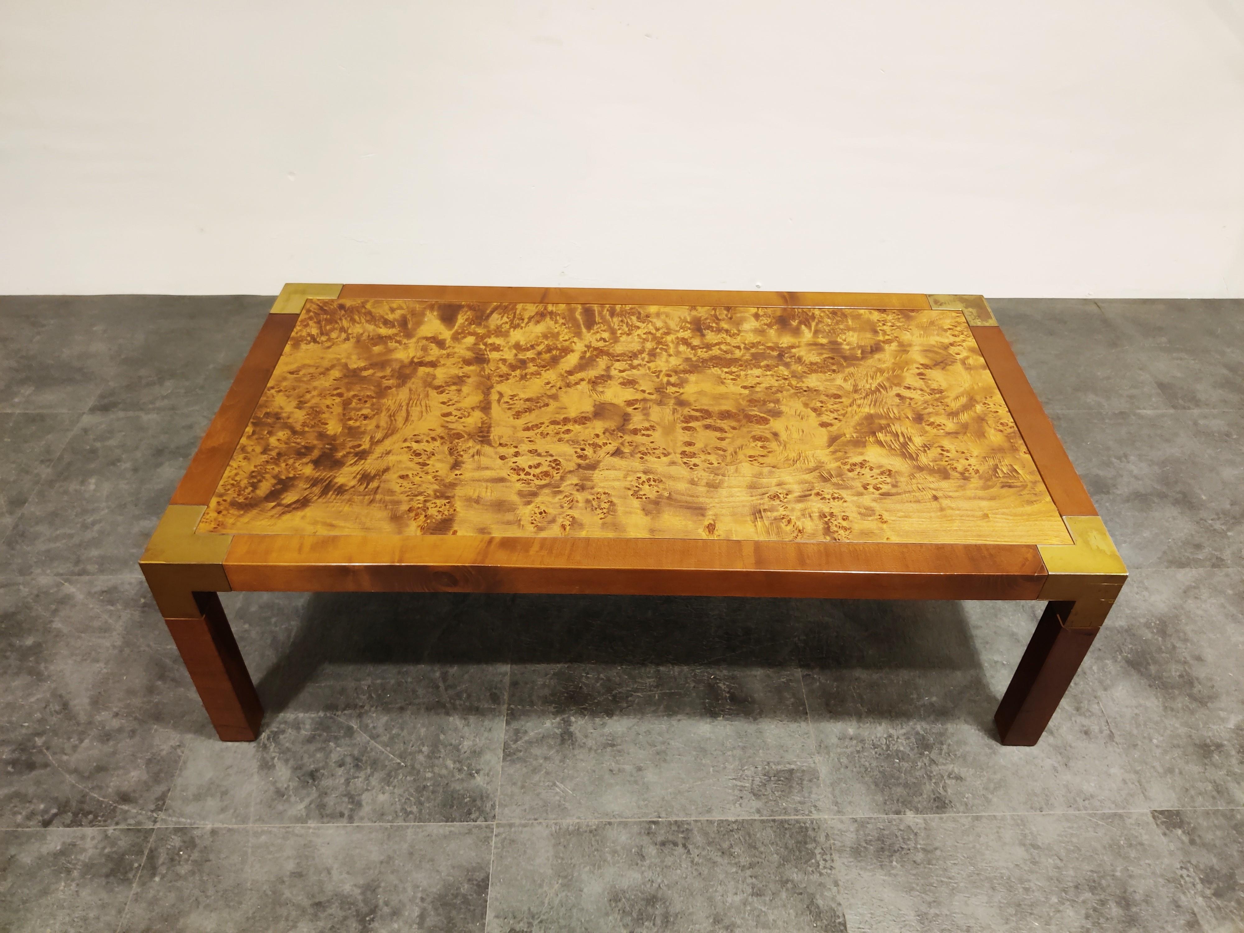 Elegant rectangular burl wooden coffee table with brass. 

Timeless seventies glamour coffee table.

Good quality, made in France and very much in the style of Jean Claude Maehey furniture.

Condition: Normal wear with some scratches in the