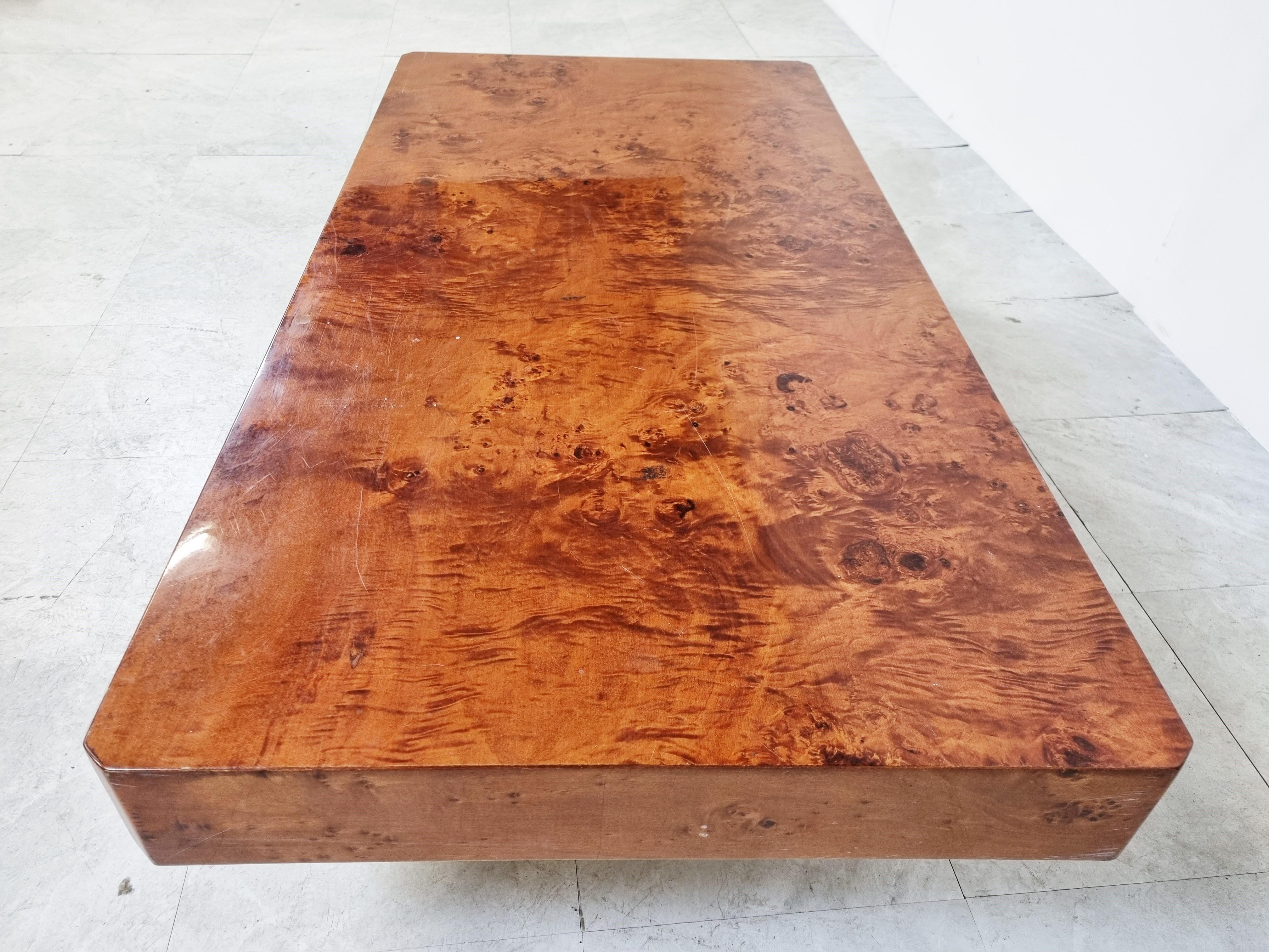 Elegant rectangular burl wooden coffee table.

Timeless seventies glamour coffee table.

Good quality, made in france and very much in the style of Jean Claude Mahey furniture.

This one is from a high end furniture shop called 'Roche
