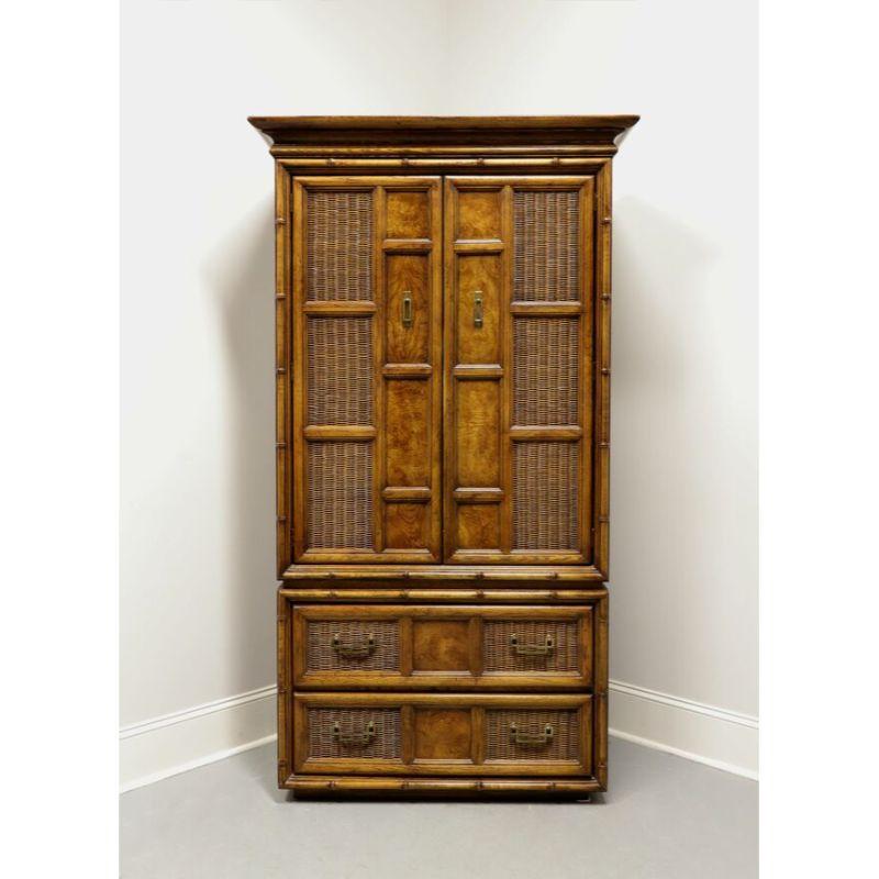 An Asian style gentleman's chest by Burlington House. Pecan, burlwood and wicker panels, faux bamboo styling and brass hardware. Upper cabinet features double doors revealing a fixed top shelf, three middle cubbies (11.75w 15d 13.25h) and two