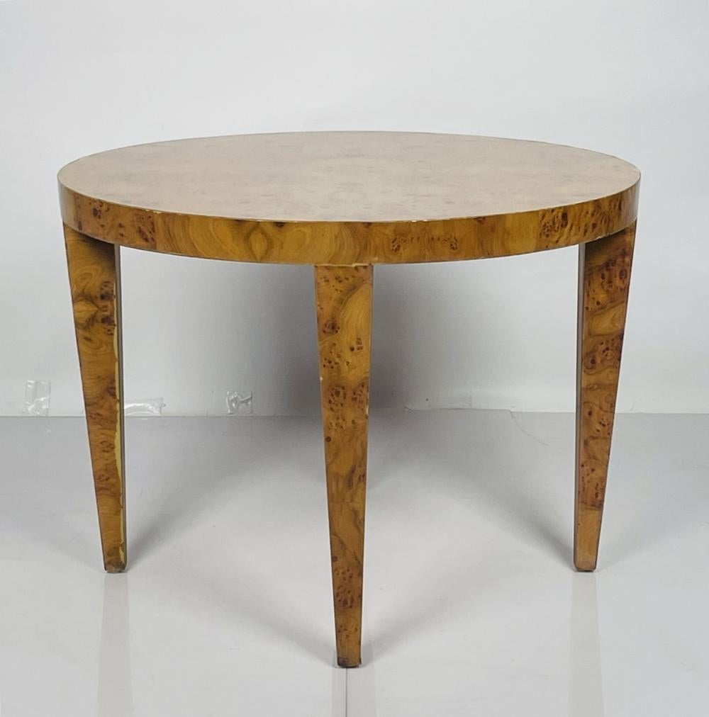 Introducing our exquisite Vintage Burlwood Center Table, a true masterpiece of American craftsmanship from the 1960s. This stunning piece is designed to add a touch of elegance and sophistication to any space, combining timeless design with natural