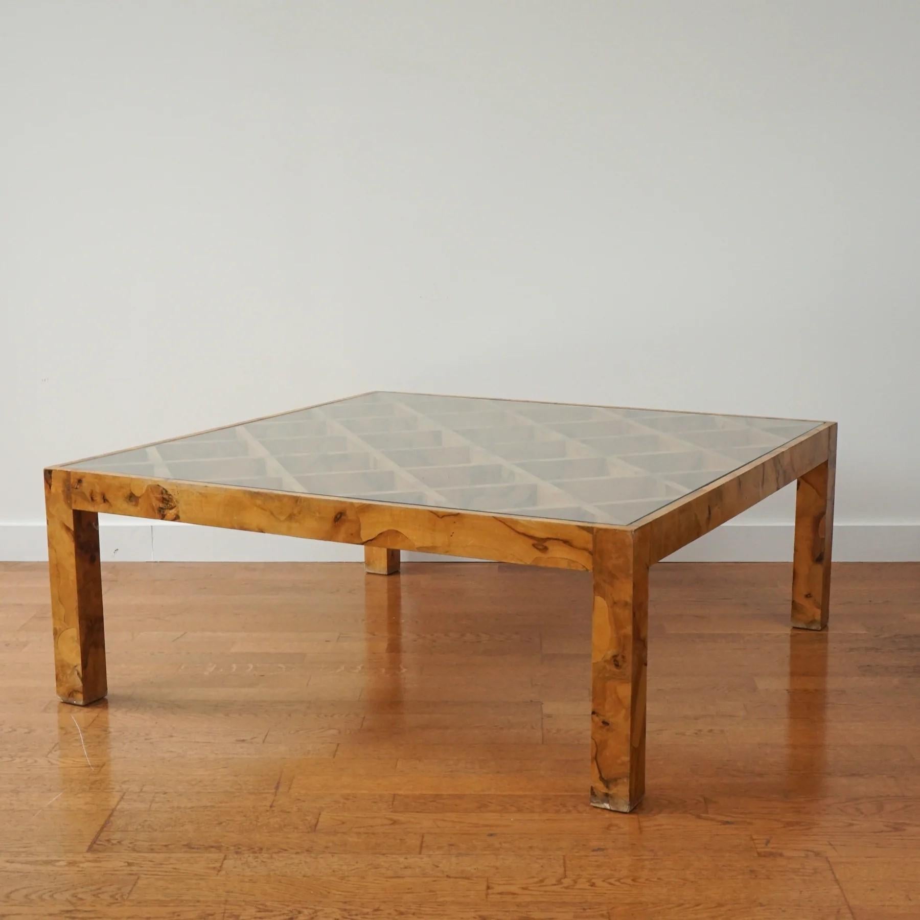 Large square burlwood coffee table with interesting lattice work detail and a glass top.