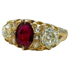 Bague vintage en or jaune 18K avec rubis et diamants de Birmanie Lotus GIA