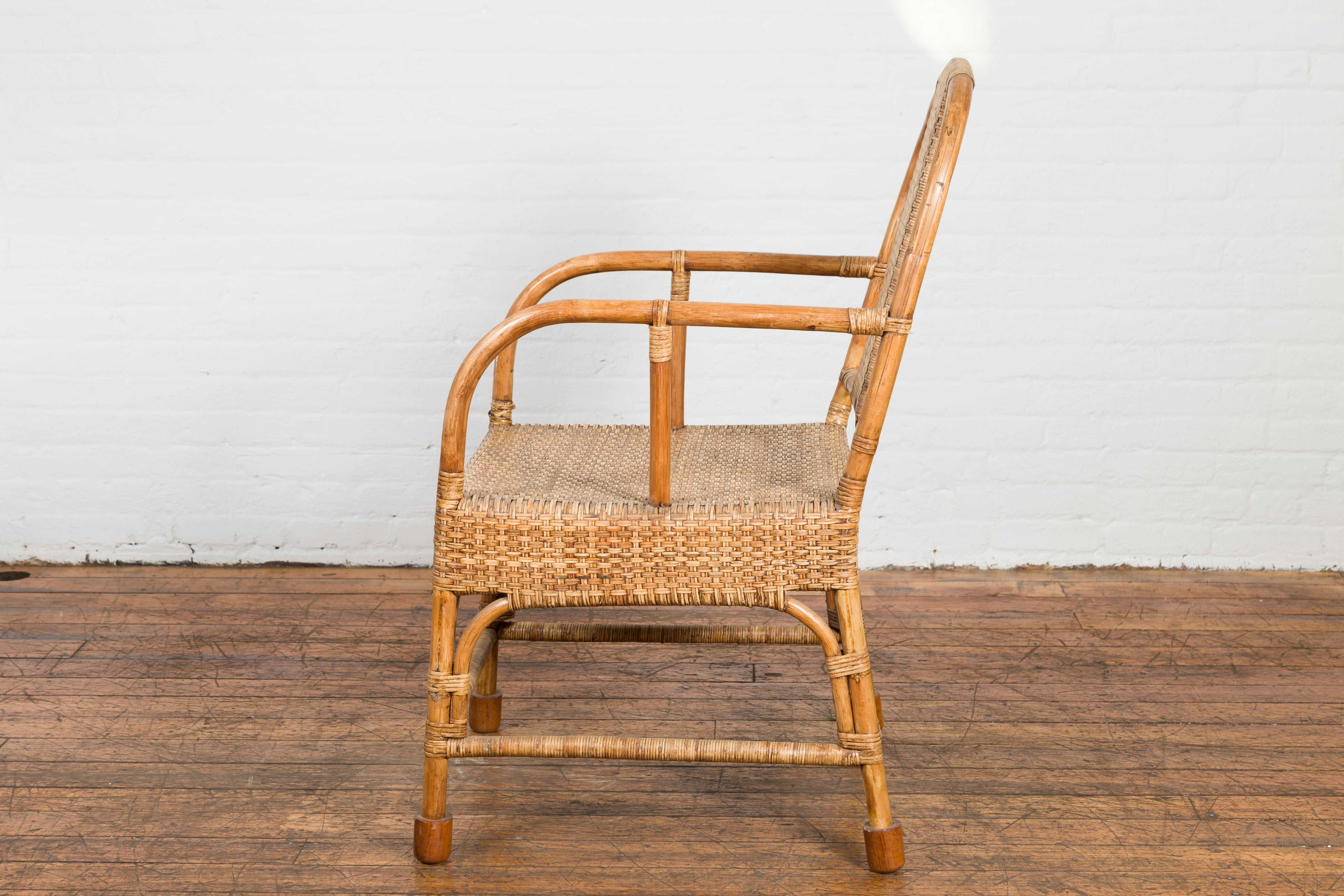 Vintage Burmese Country Style Hand-Woven Rattan Armchair with Rounded Back For Sale 9
