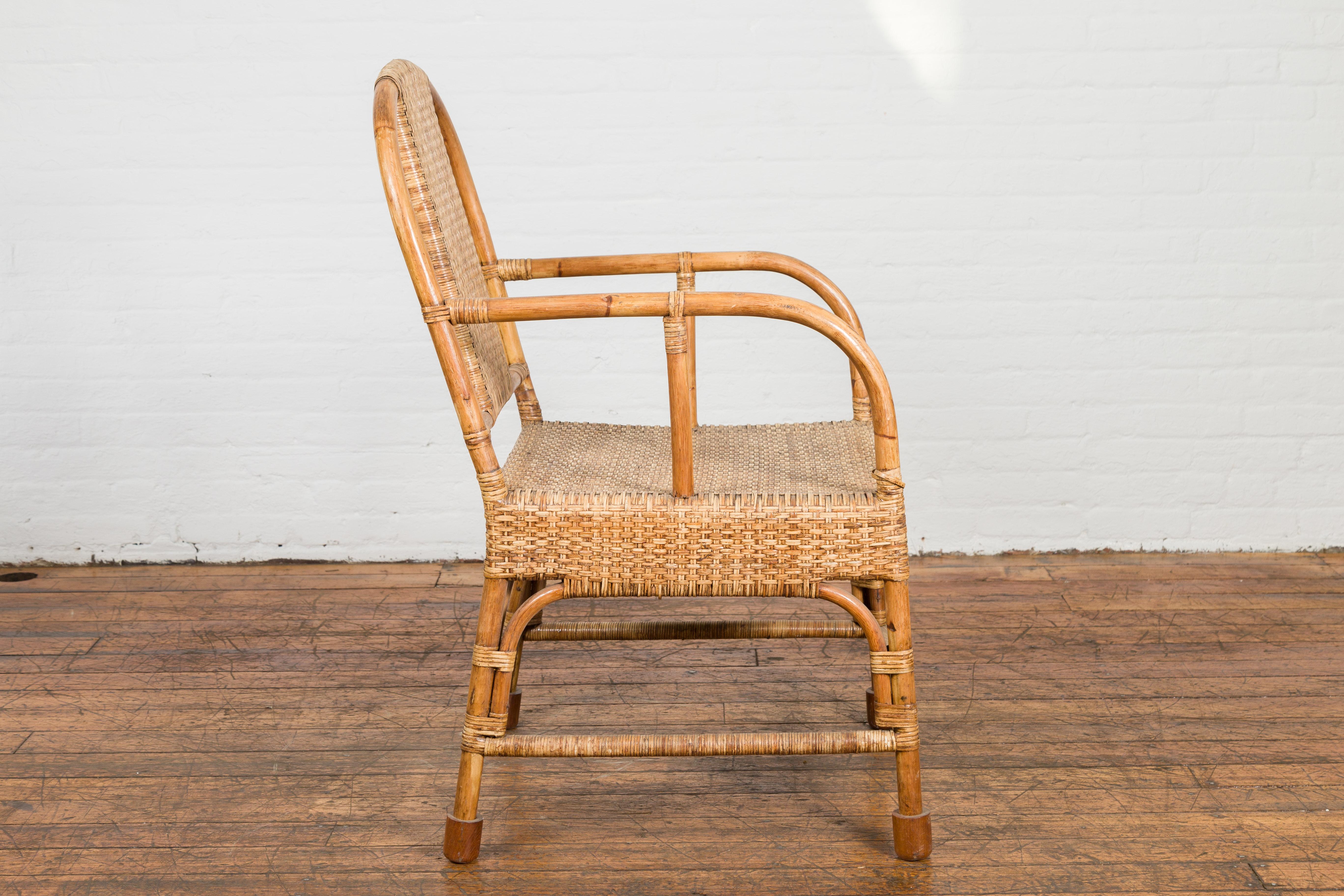 Vintage Burmese Country Style Hand-Woven Rattan Armchair with Rounded Back For Sale 5