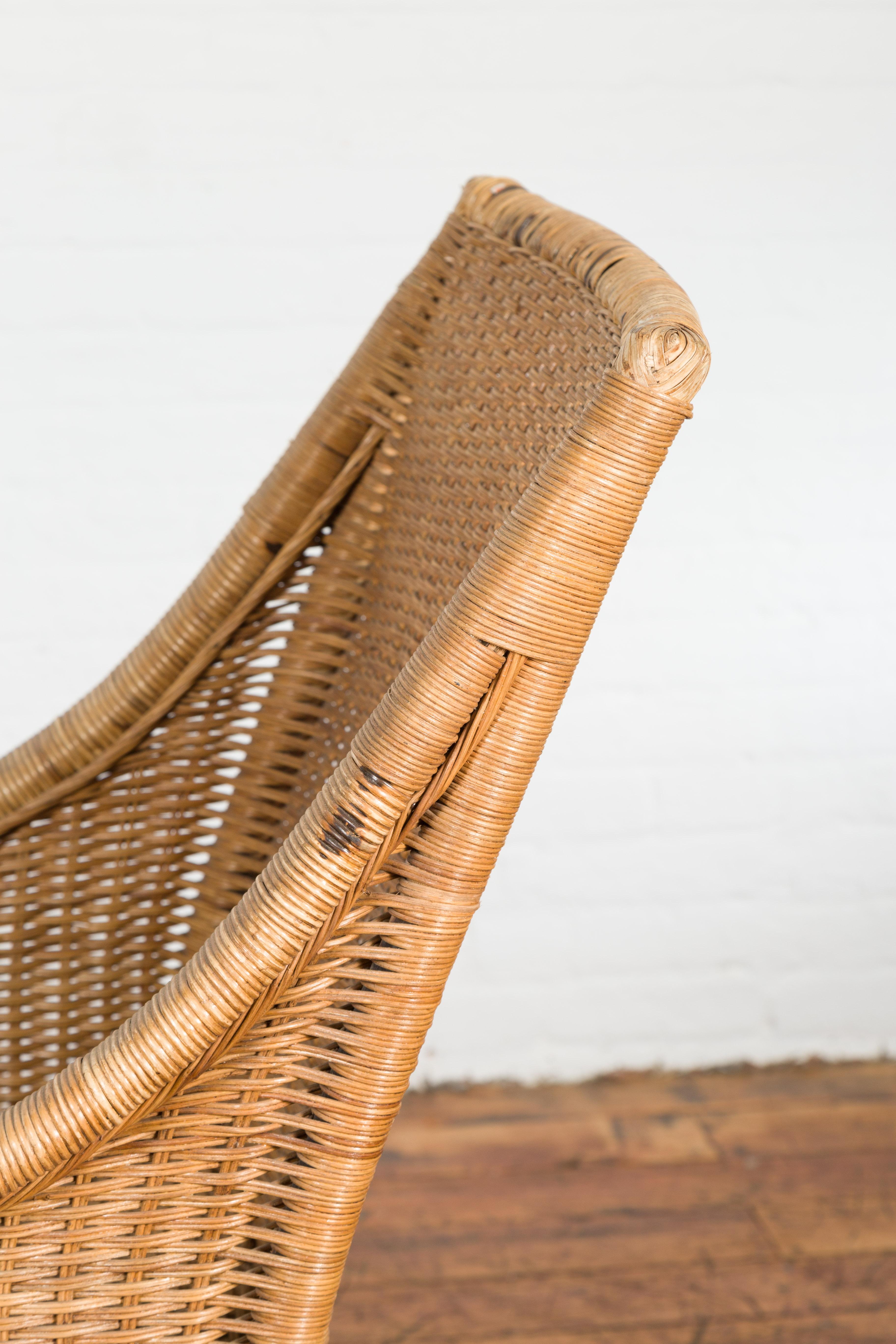 Vintage Burmese Country Style Woven Rattan Lounge Chair with Arching Accents For Sale 12