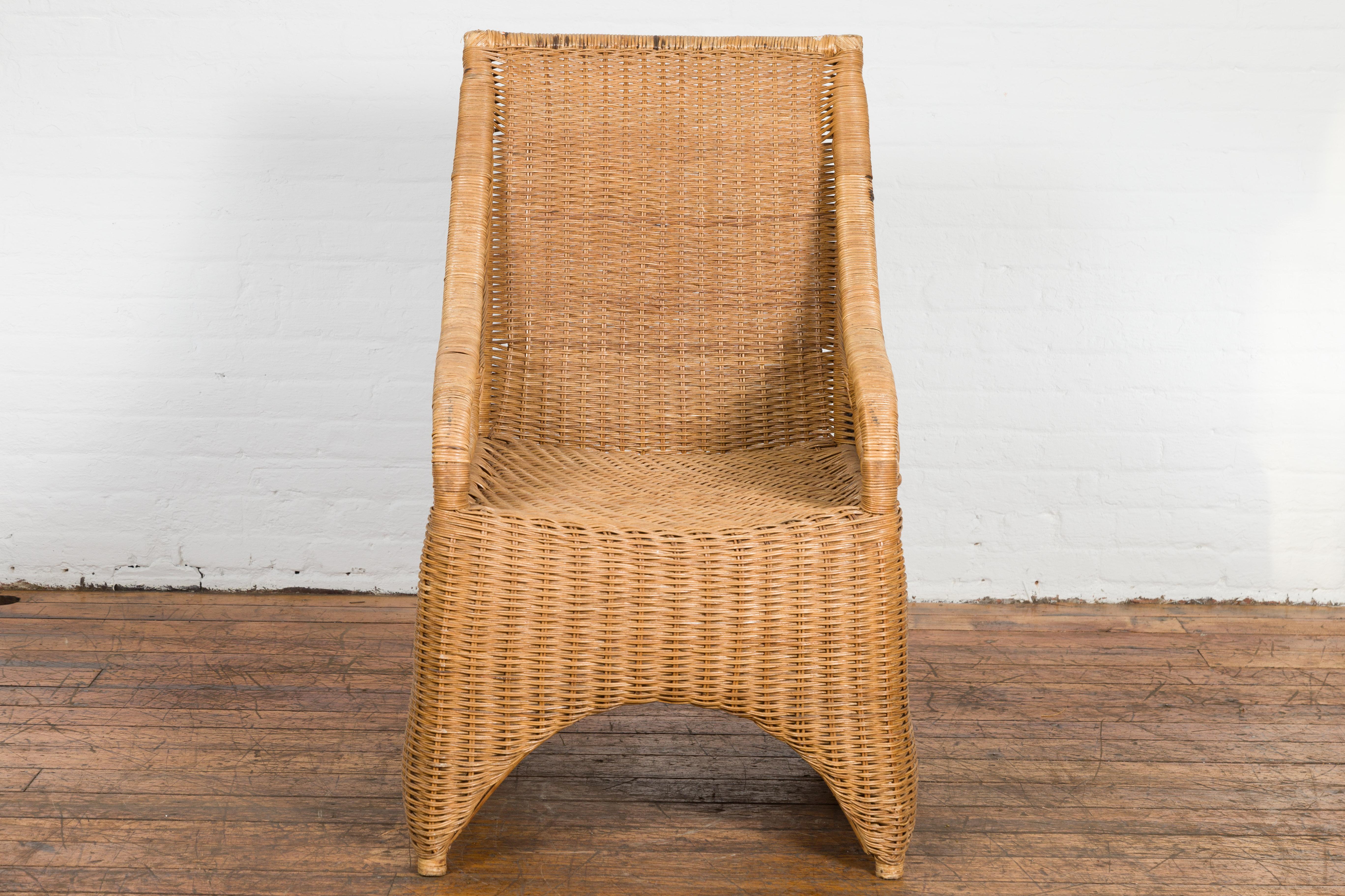 Vintage Burmese Country Style Woven Rattan Lounge Chair with Arching Accents In Good Condition For Sale In Yonkers, NY