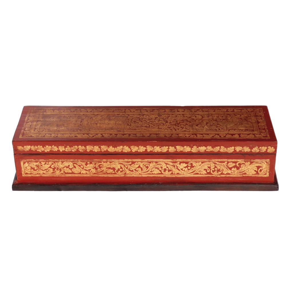 Vintage Burmese Kammavaca Manuscript Chest. A rectangular wooden hinged lid box painted red with gold leaf shwe zawa gold leaf decorations of foliate scrolls on the sides and lid. The lid further decorated on center with images of monks and a Buddha