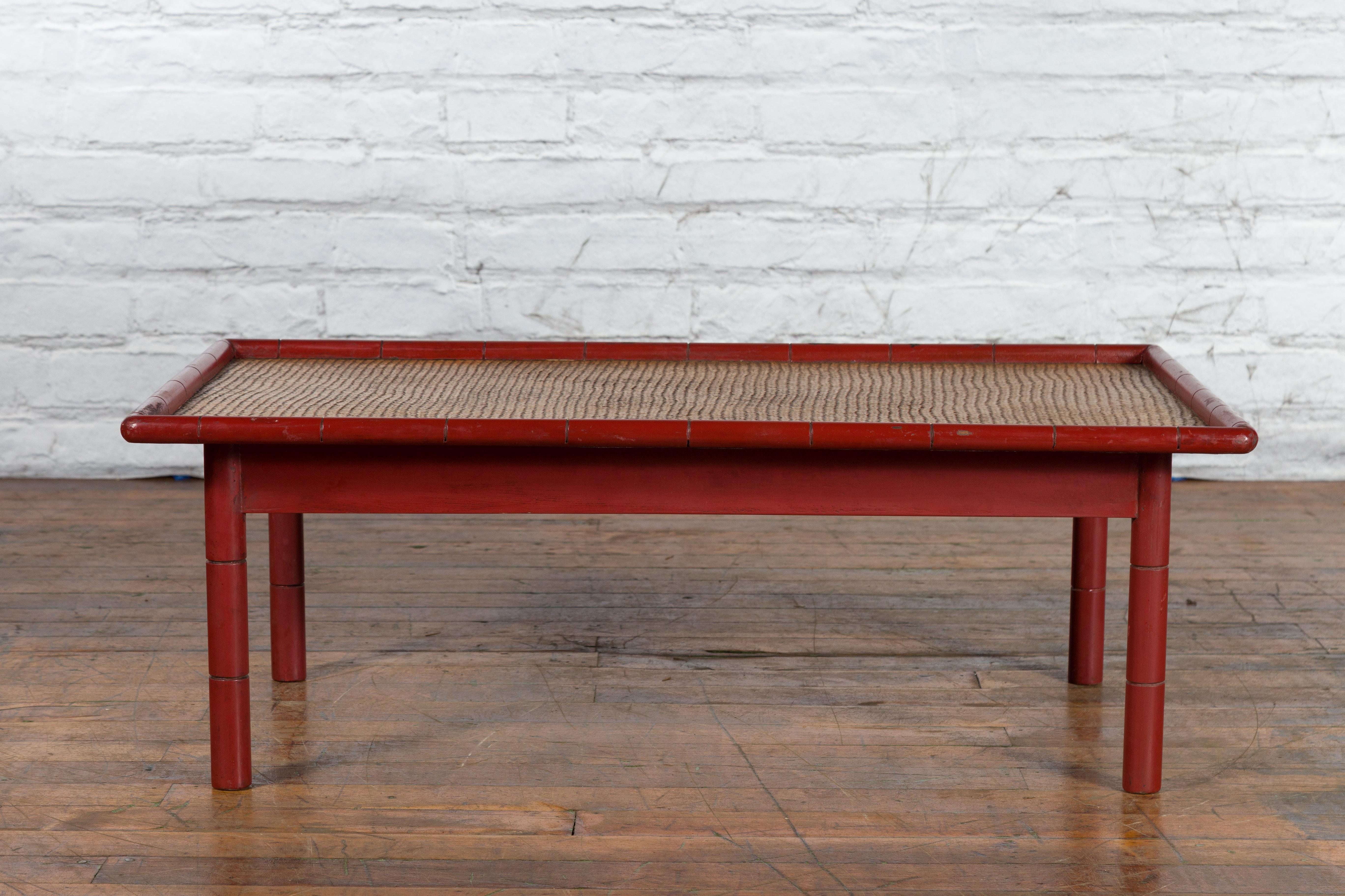 Vintage Burmese Red Lacquered Faux Bamboo Coffee Table with Woven Rattan Top In Good Condition For Sale In Yonkers, NY