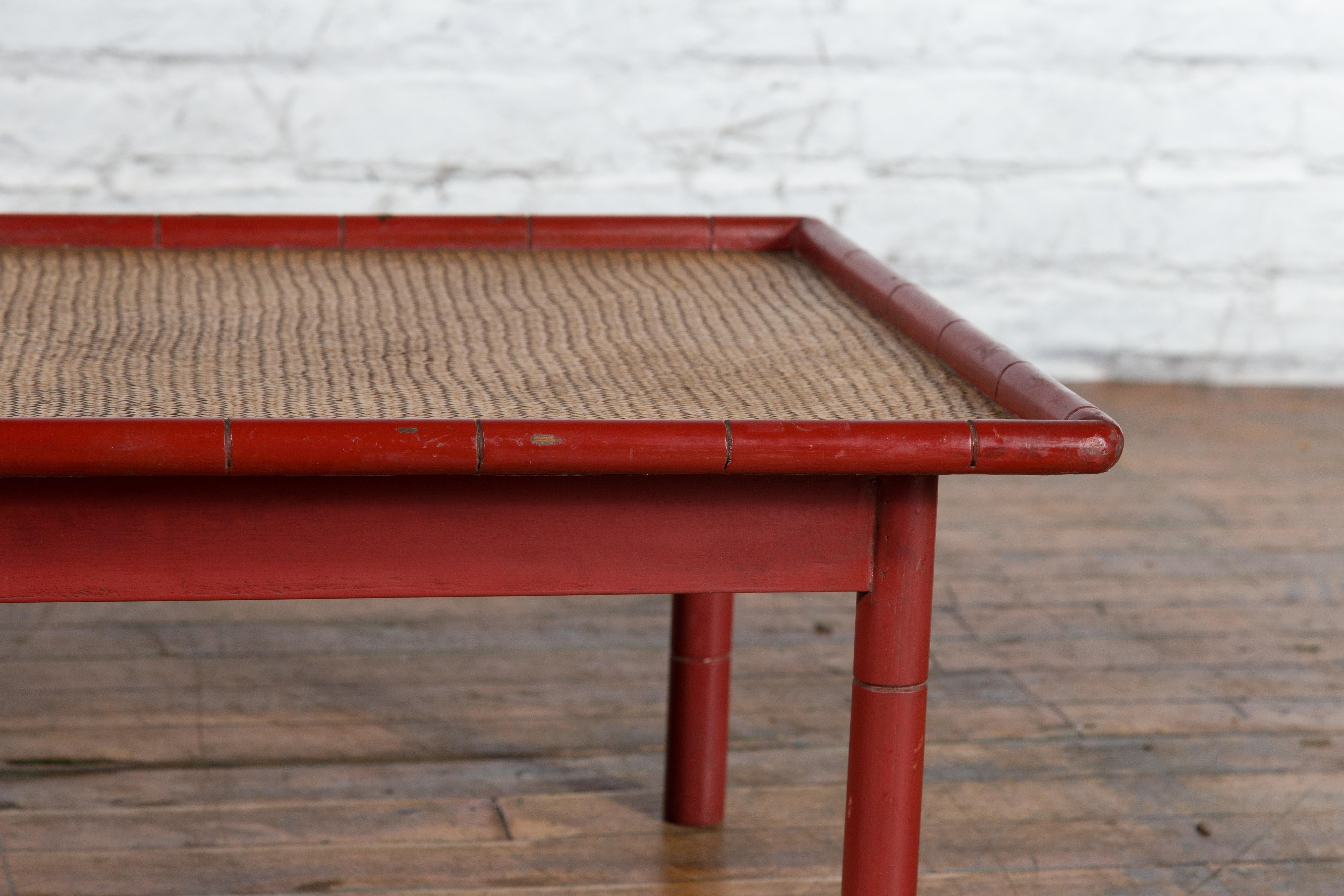 Vintage Burmese Red Lacquered Faux Bamboo Coffee Table with Woven Rattan Top For Sale 1