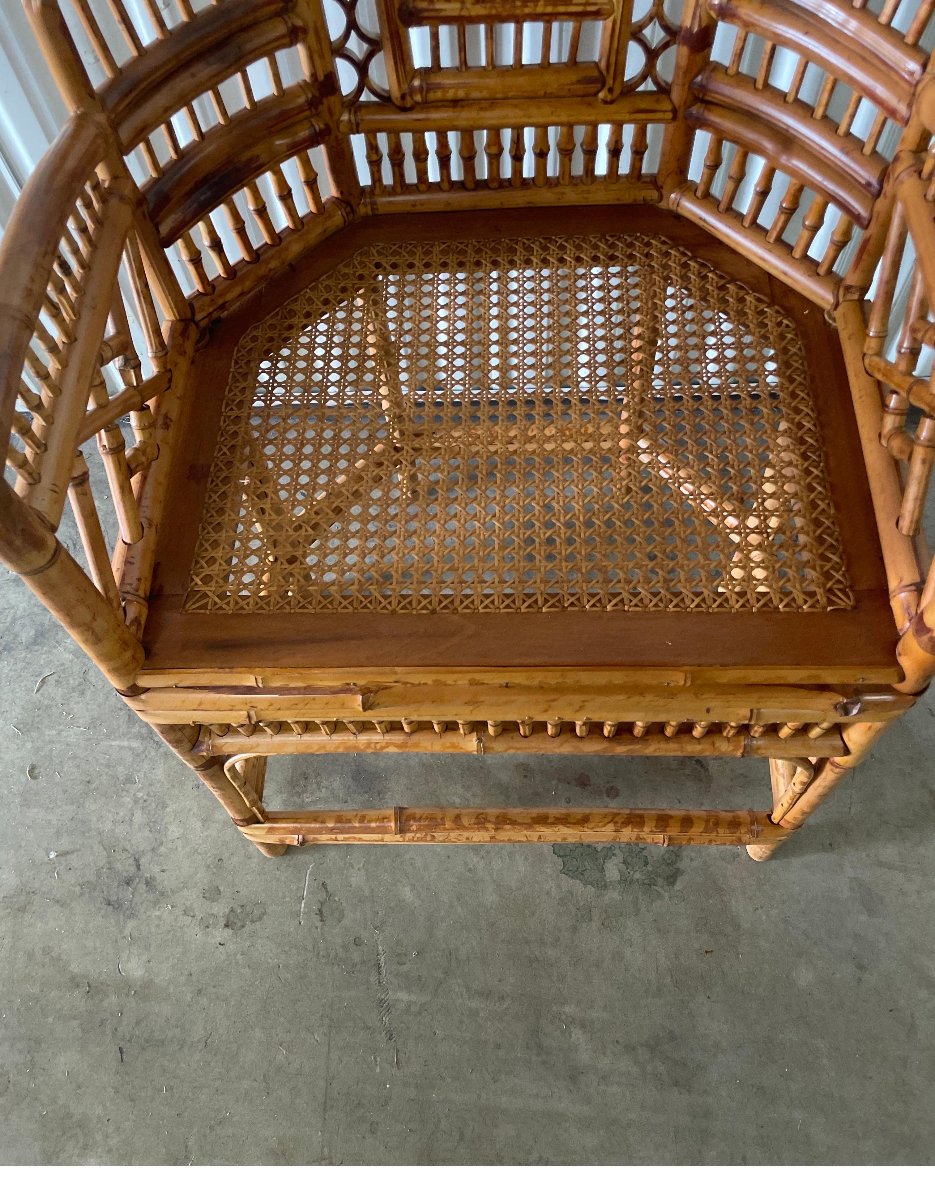 Vintage Chinoiserie style burnt bamboo & rattan Brighton chair with cane seat.