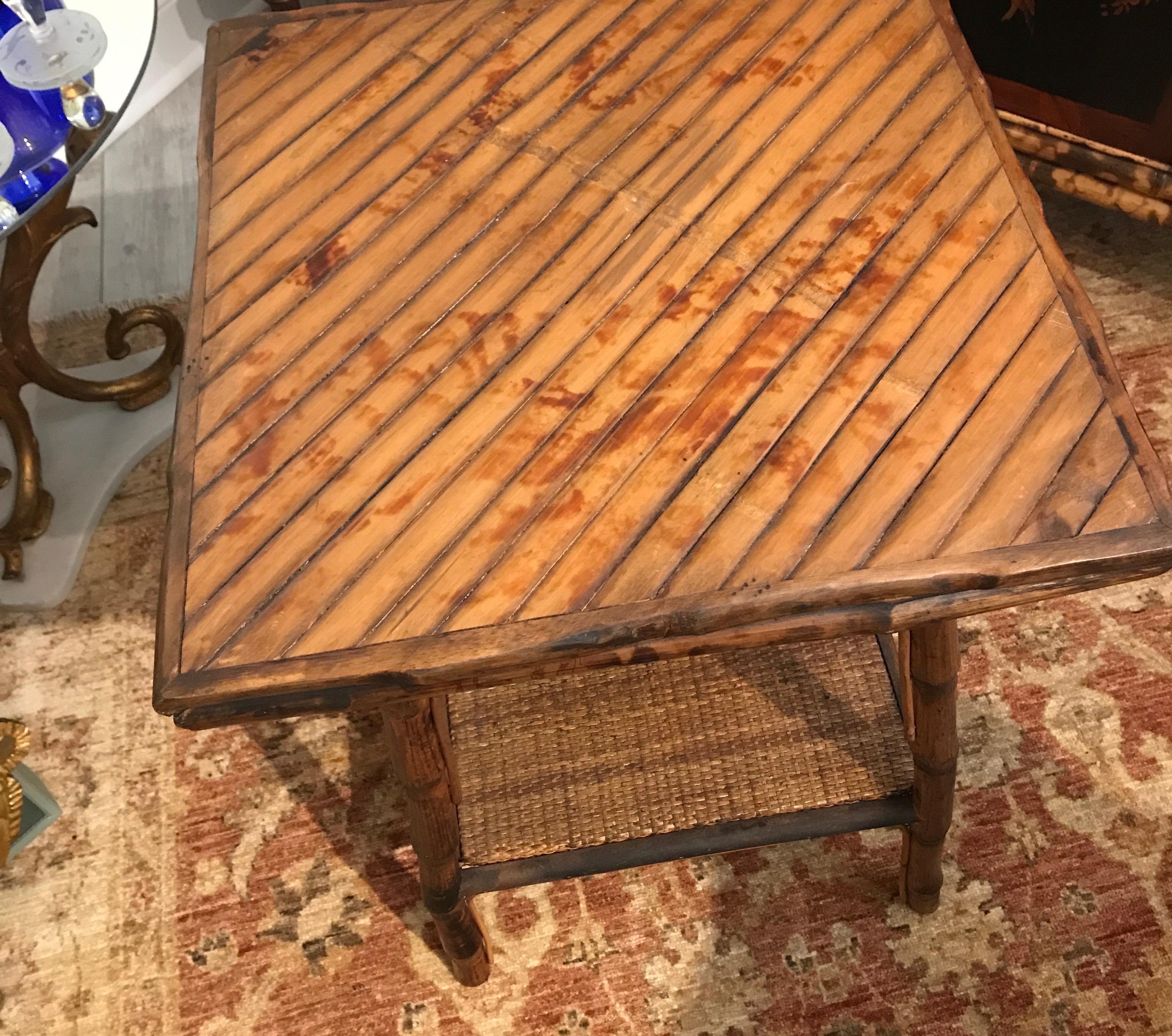 Two-tier vintage burnt bamboo side table.