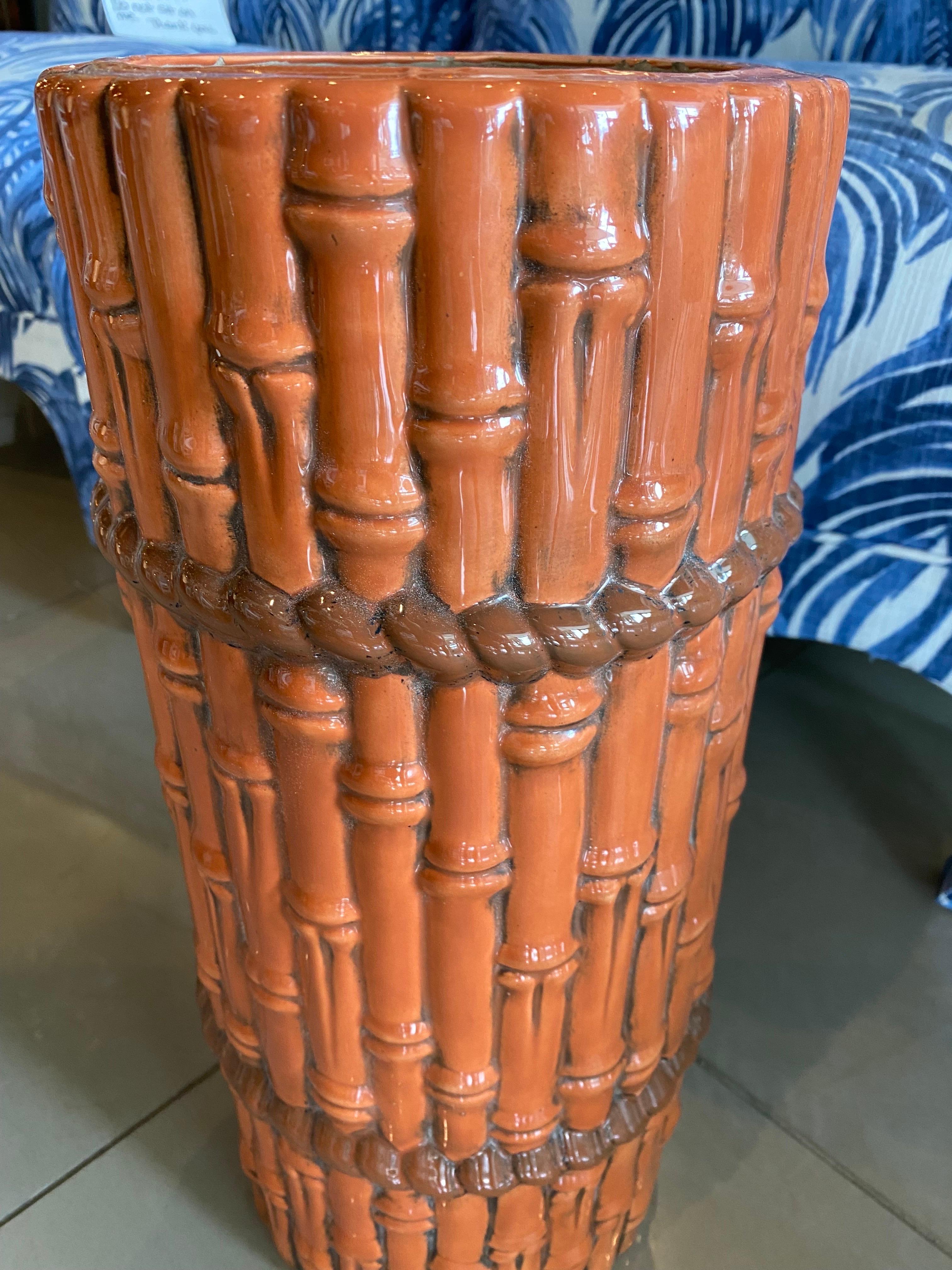 Vintage burnt orange faux bamboo ceramic umbrella stand. No chips or breaks, Dimensions: 17.5 H x 8 D.