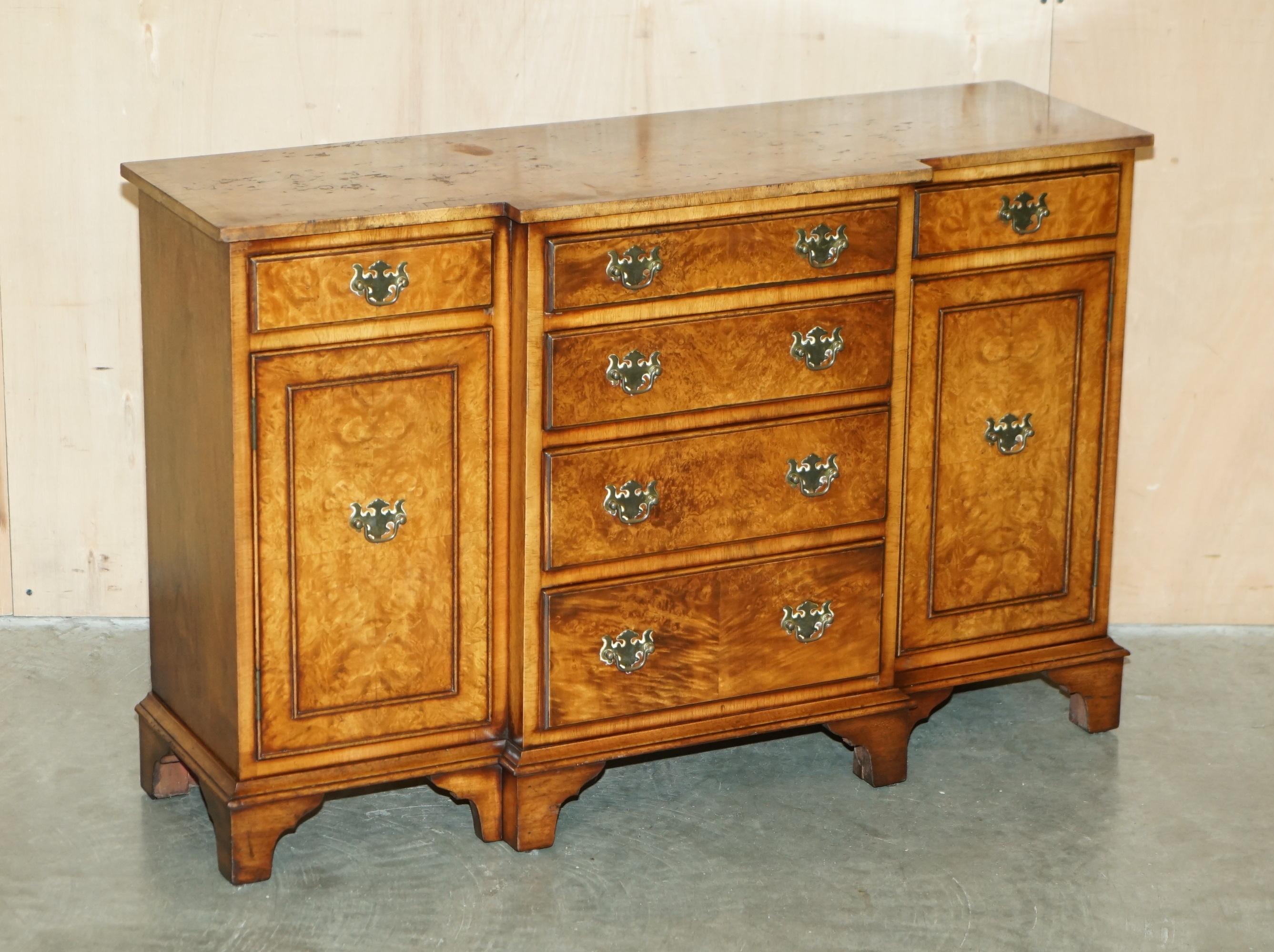 Royal House Antiques

Royal House Antiques is delighted to offer for sale this lovely small Burr & Burl Walnut breakfront sideboard with bank of drawers to the middle 

Please note the delivery fee listed is just a guide, it covers within the M25