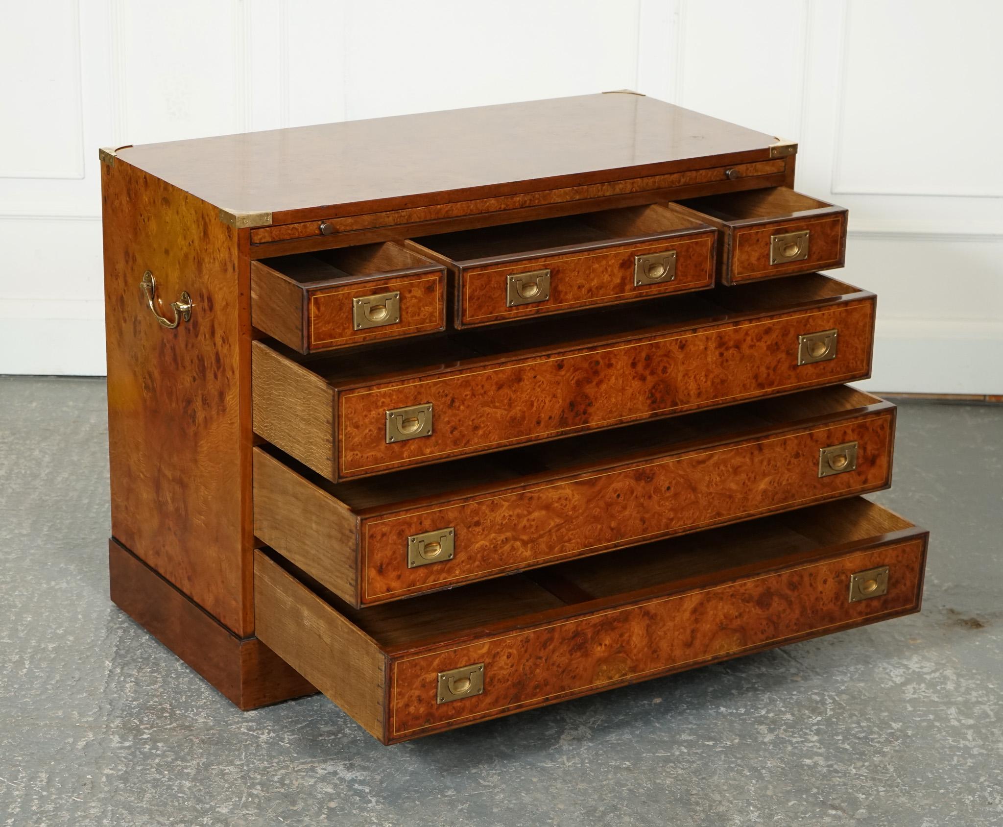 
Antiques of London



We are delighted to offer for sale this lovely Vintage Military Campaign Chest Of Drawers.

A stunning and unique piece of furniture that combines elegance and functionality. The chest is crafted from gorgeous Burr Elm wood,