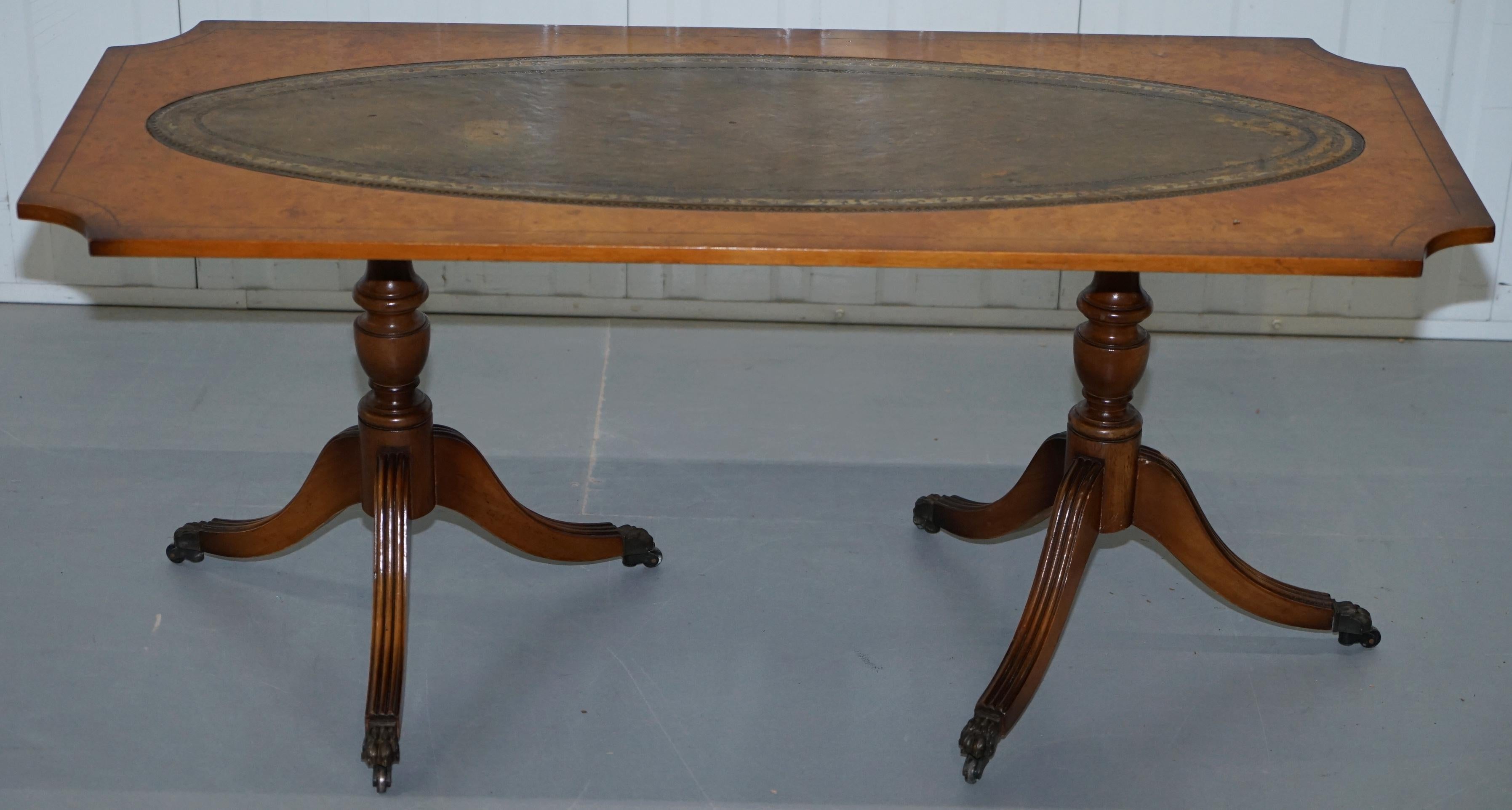 We are delighted to offer for sale this very good looking vintage Burr Walnut coffee table with aged green leather top finished with Lion paw castors

Please note the delivery fee listed is just a guide, it covers within the M25 only, for an