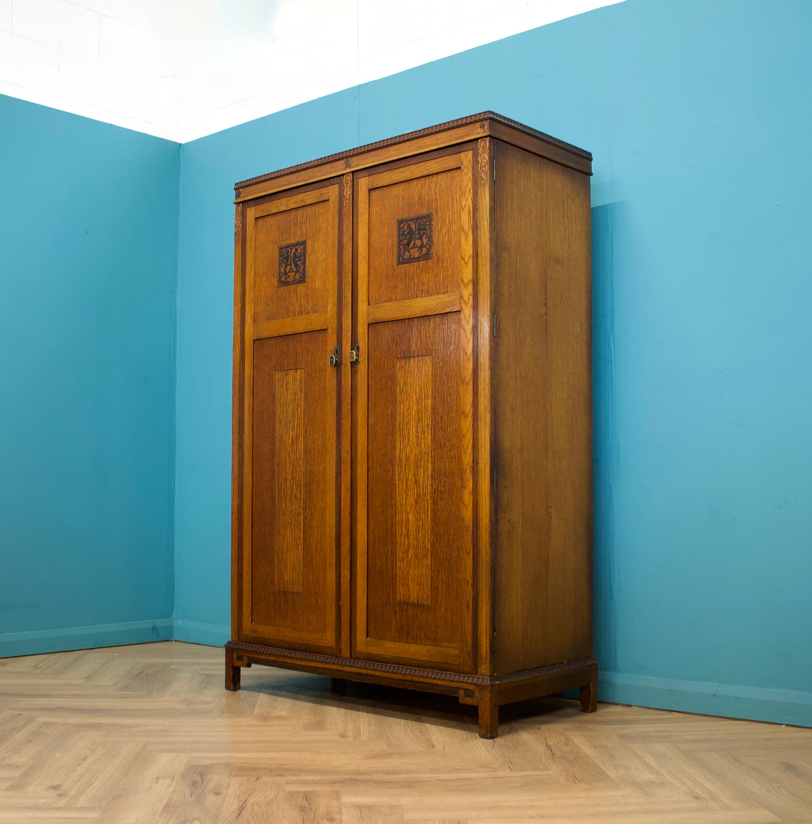 A vintage Oak Art Deco compactum / compact wardrobe
Made by Harris Lebus, circa 1930's (hinges stamped HL)
Inside is beautifully fitted out with a pull forward clothes rail, metal shelves and drawers