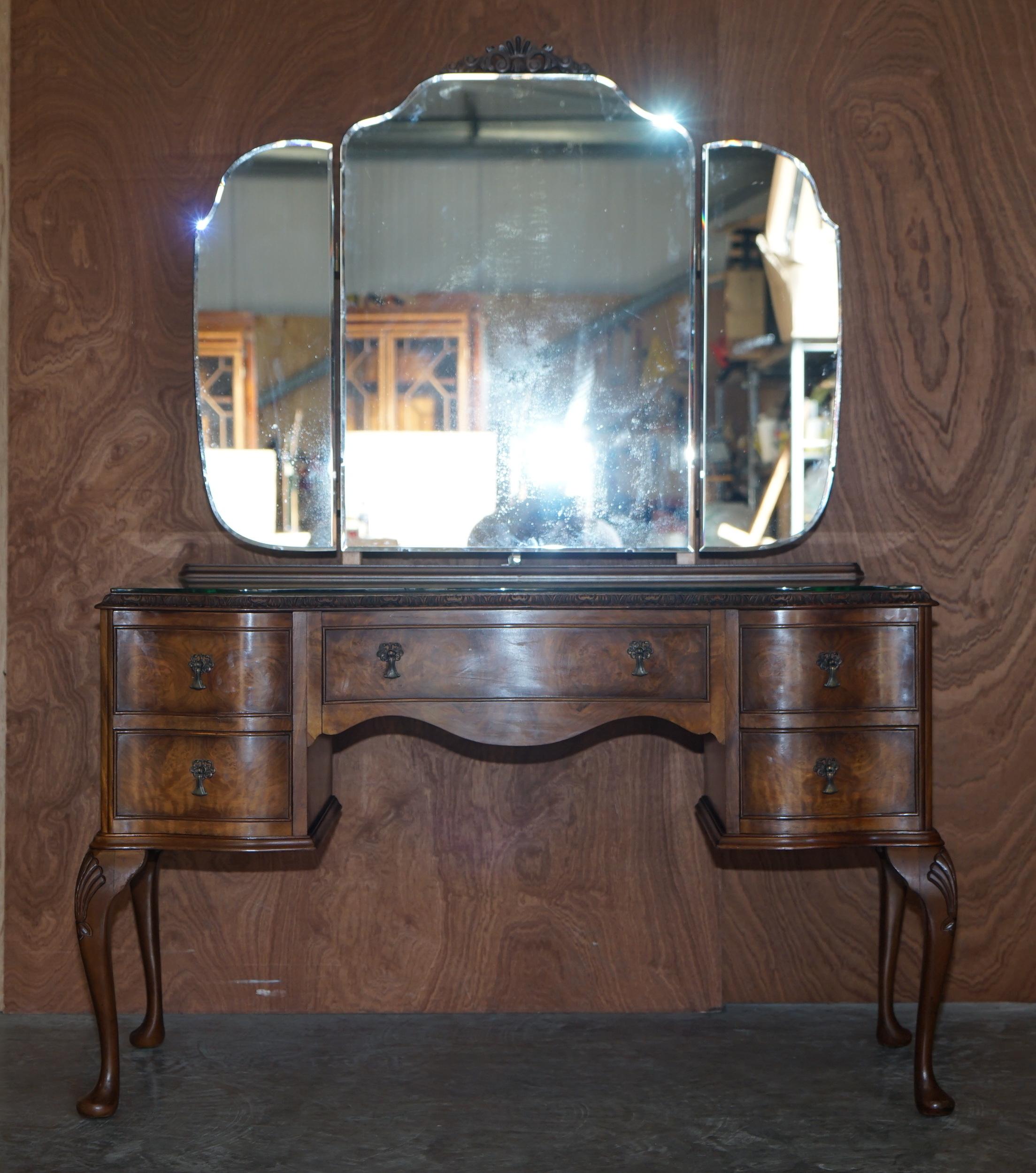 We are delighted to offer for sale this lovely circa 1930’s large Burr Walnut dressing table with tri folding mirrors.

This dressing table is in good period condition, it offers lots of internal storage space, the mirrors are tri fold so you can