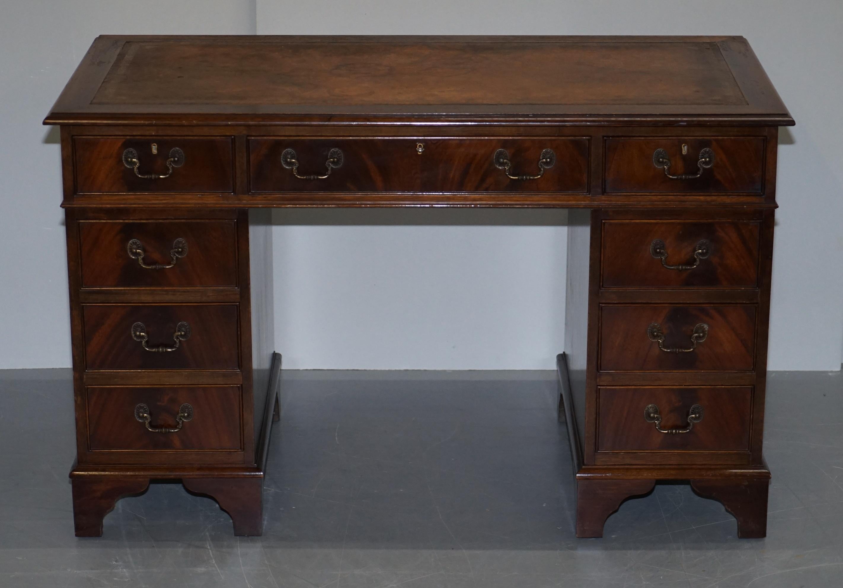I am delighted to offer for sale this mahogany twin pedestal partner desk with original vintage brown leather top 

Please note the delivery fee listed is just a guide, it covers within the M25 only, for an accurate quote please send me your