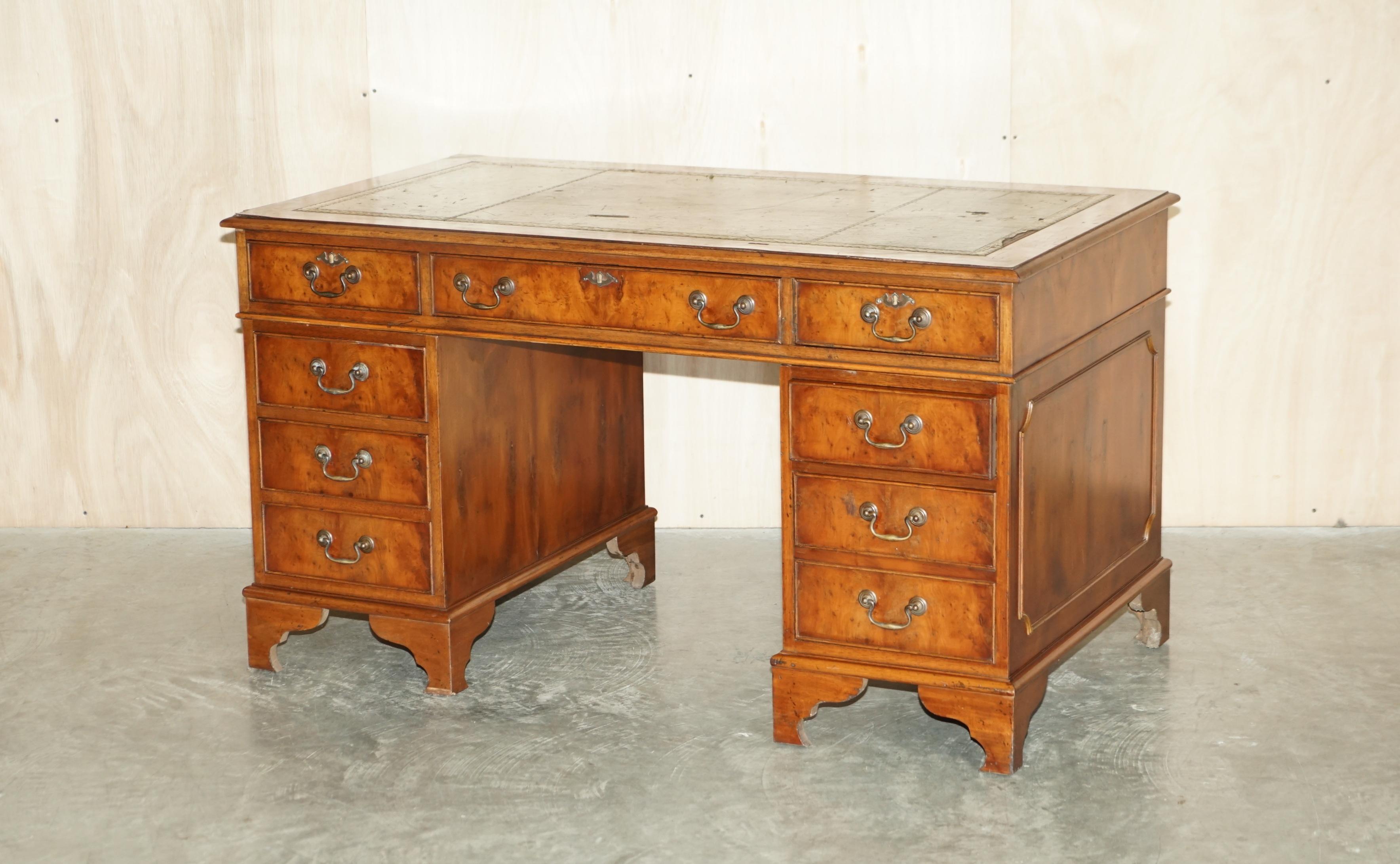 Royal House Antiques

Royal House Antiques is delighted to offer for sale this lovely vintage Burr Walnut twin pedestal partner desk with original distressed green leather top 

Please note the delivery fee listed is just a guide, it covers within