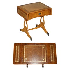 Tavolino allungabile in legno di quercia Wood Wood, pelle marrone, foglia d'oro, legno di quercia.