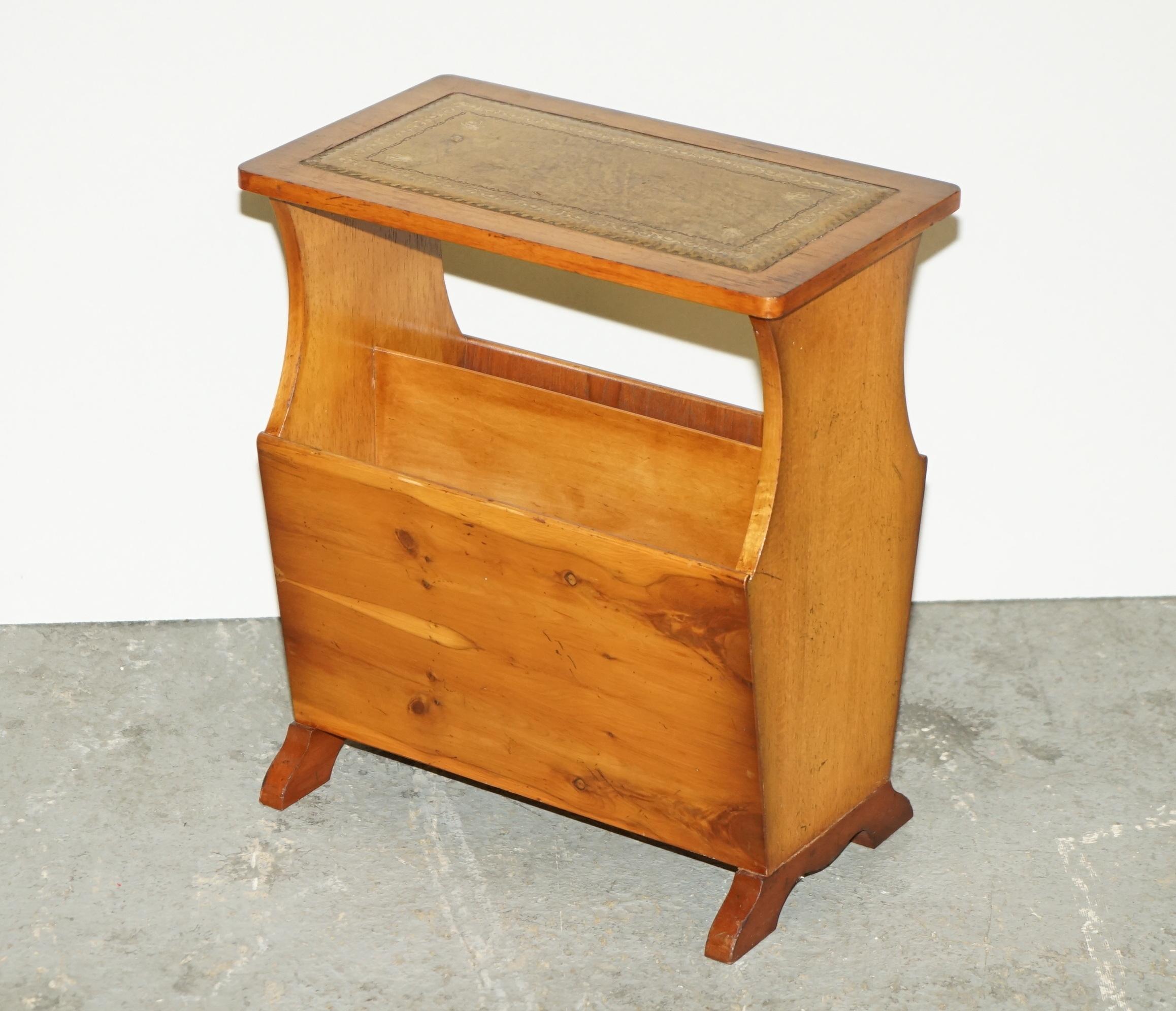 All Vintage Antiques is delighted to offer for sale this lovely vintage Burr Yew Wood magazine rack side table with gold leaf embossed brown leather top

Please note the delivery fee listed is just a guide, it covers within the M25 only for the UK