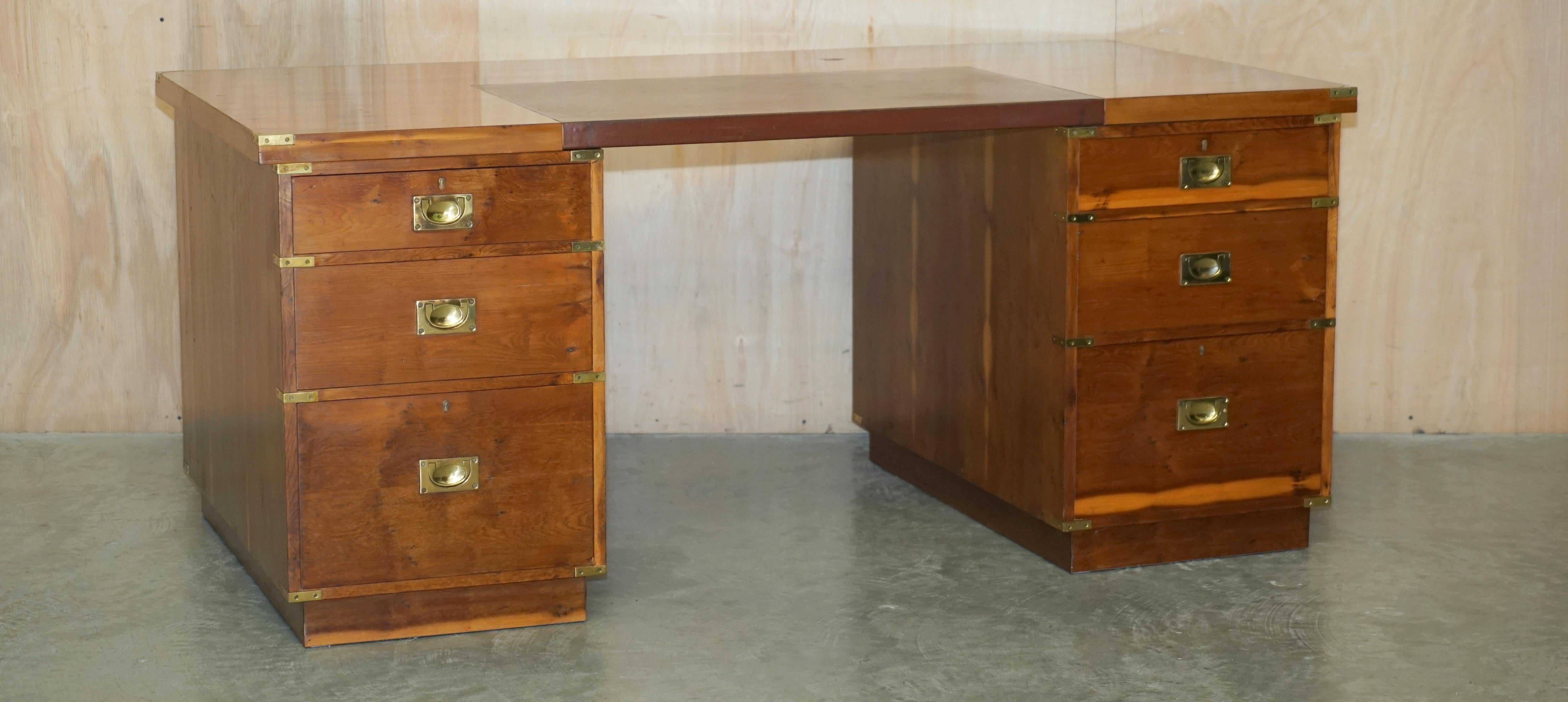 Royal House Antiques

Royal House Antiques is delighted to offer for sale this lovely burr yew wood, vintage twin pedestal partner desk with bookcase / cupboard back 

Please note the delivery fee listed is just a guide, it covers within the M25