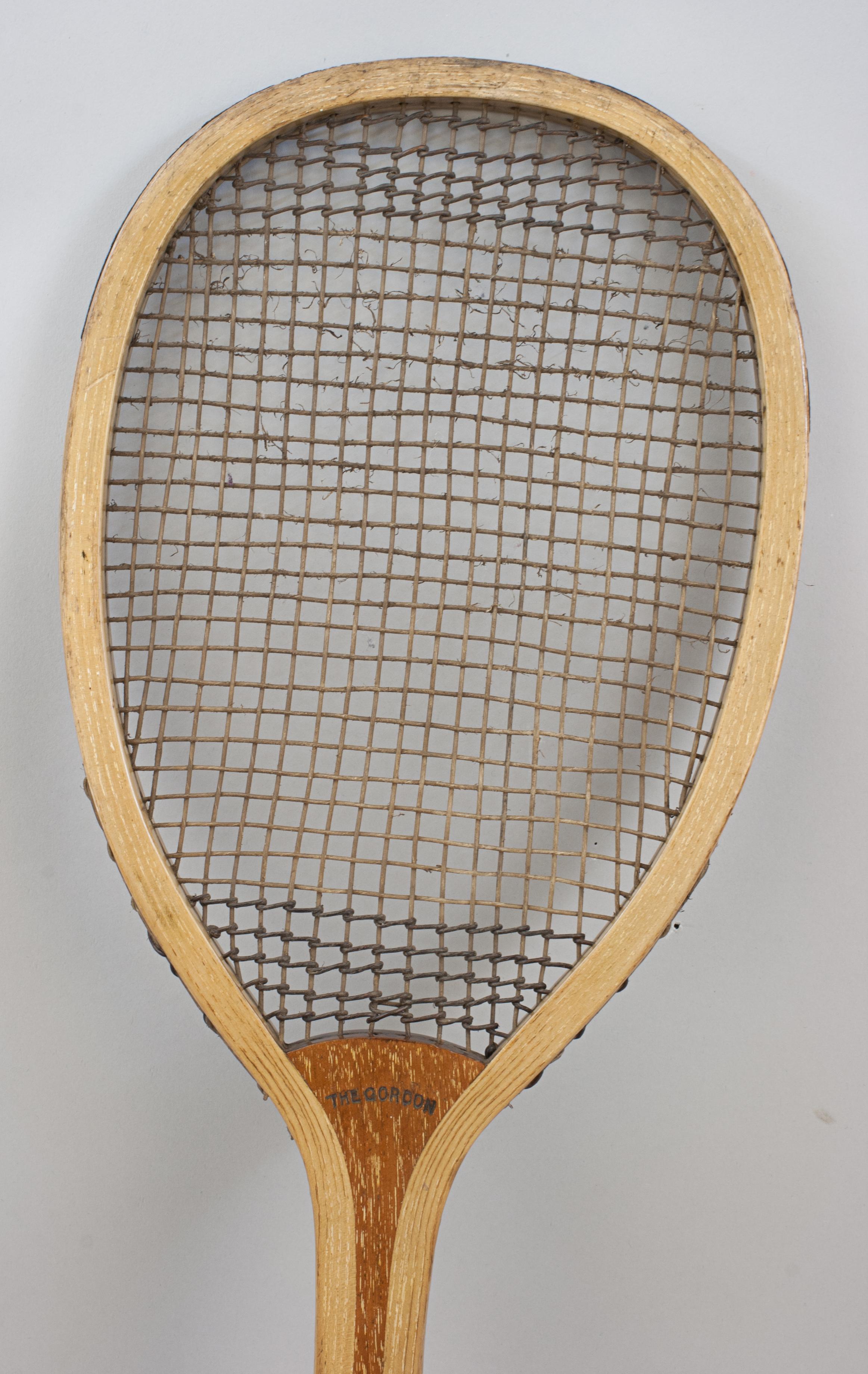 George Bussey Wooden Fishtail Tennis Racket, The Gordon
A lawn tennis racket by Bussey, 'The Gordon'. A nice ash frame with convex walnut wedge. The wedge is stamped 'The Gordon', top of the racket with a very faint 'Bussey' mark. The racket has