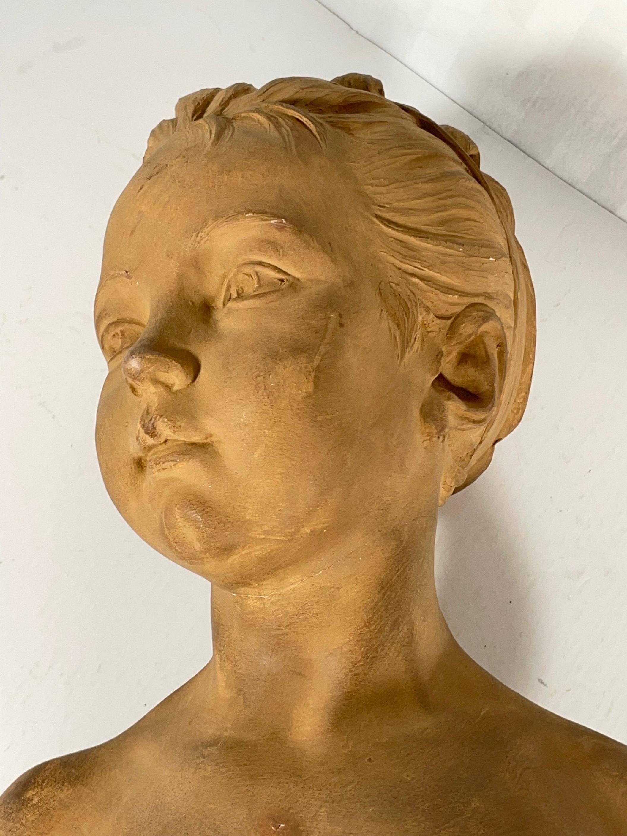 Plâtre Buste de jeune fille en plâtre de couleur terre cuite, sculpture de Jean-Antoine Houdon.